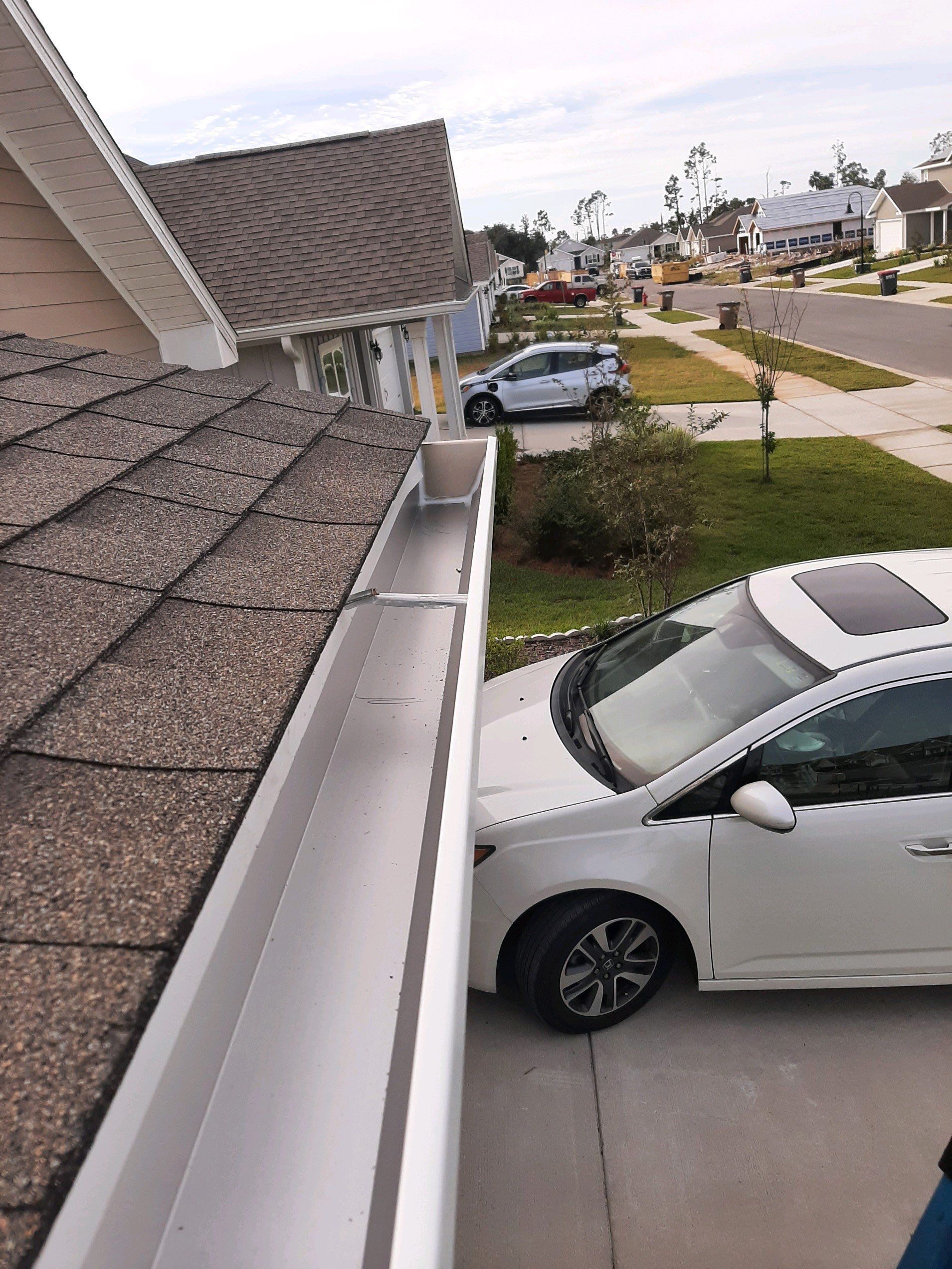 Seamless Gutter Installation using White K-Style Gutters by Gutter Professors
