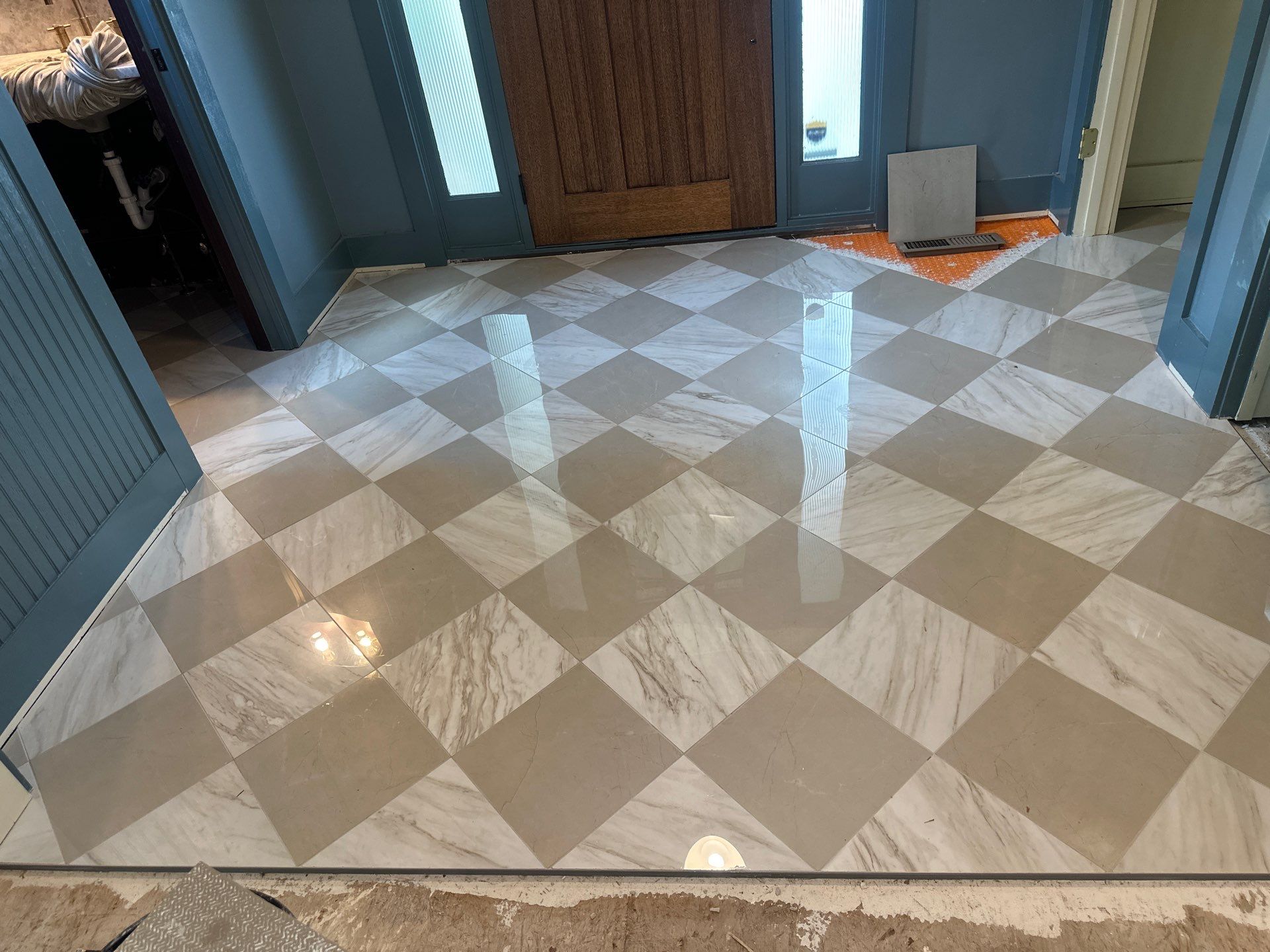 White Oak Hardwood and Checkerboard Tile Installation by Footprints Floors of Nashville