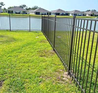 Aluminum Fence Installation using Black 3 Rail Aluminum Fence