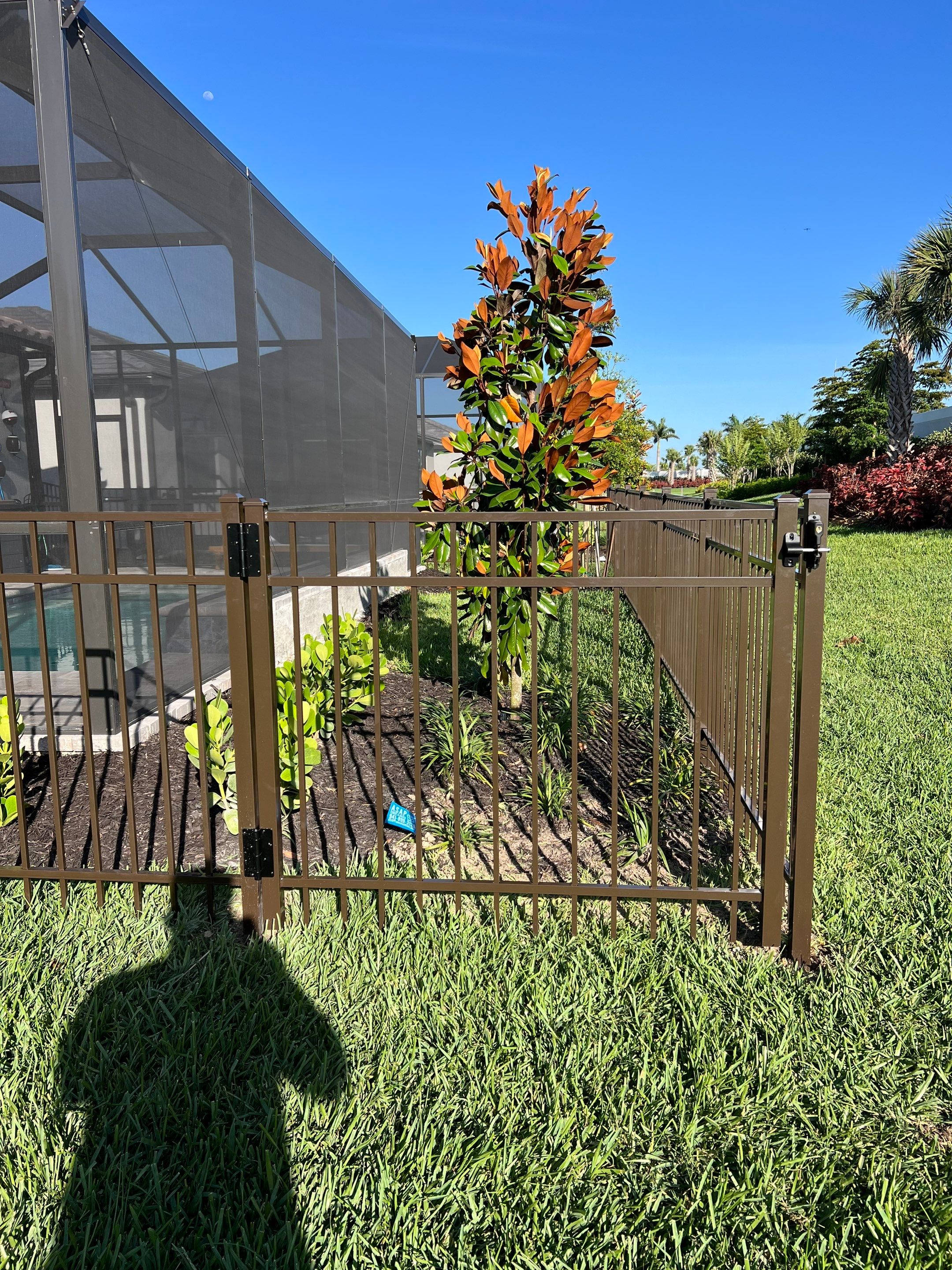 Aluminum Fence Installation using Bronze 3 Rail Aluminum Fence by Asap fence and gates, LLC