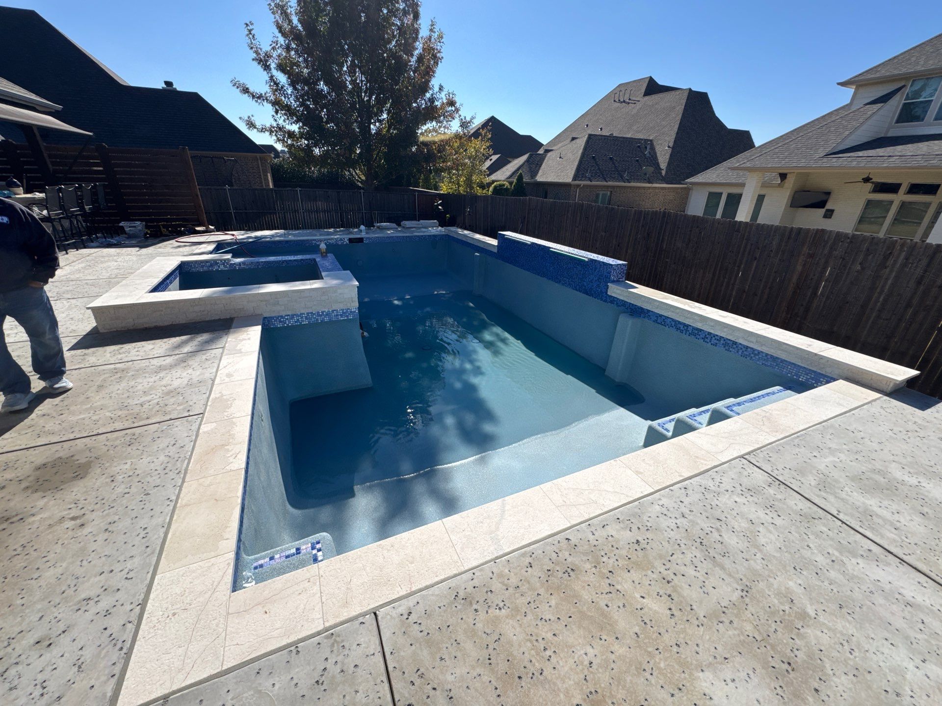 Geometric Pool with Raised Spa and Tanning Ledge by Pinnacle Pools and Spas - DFW
