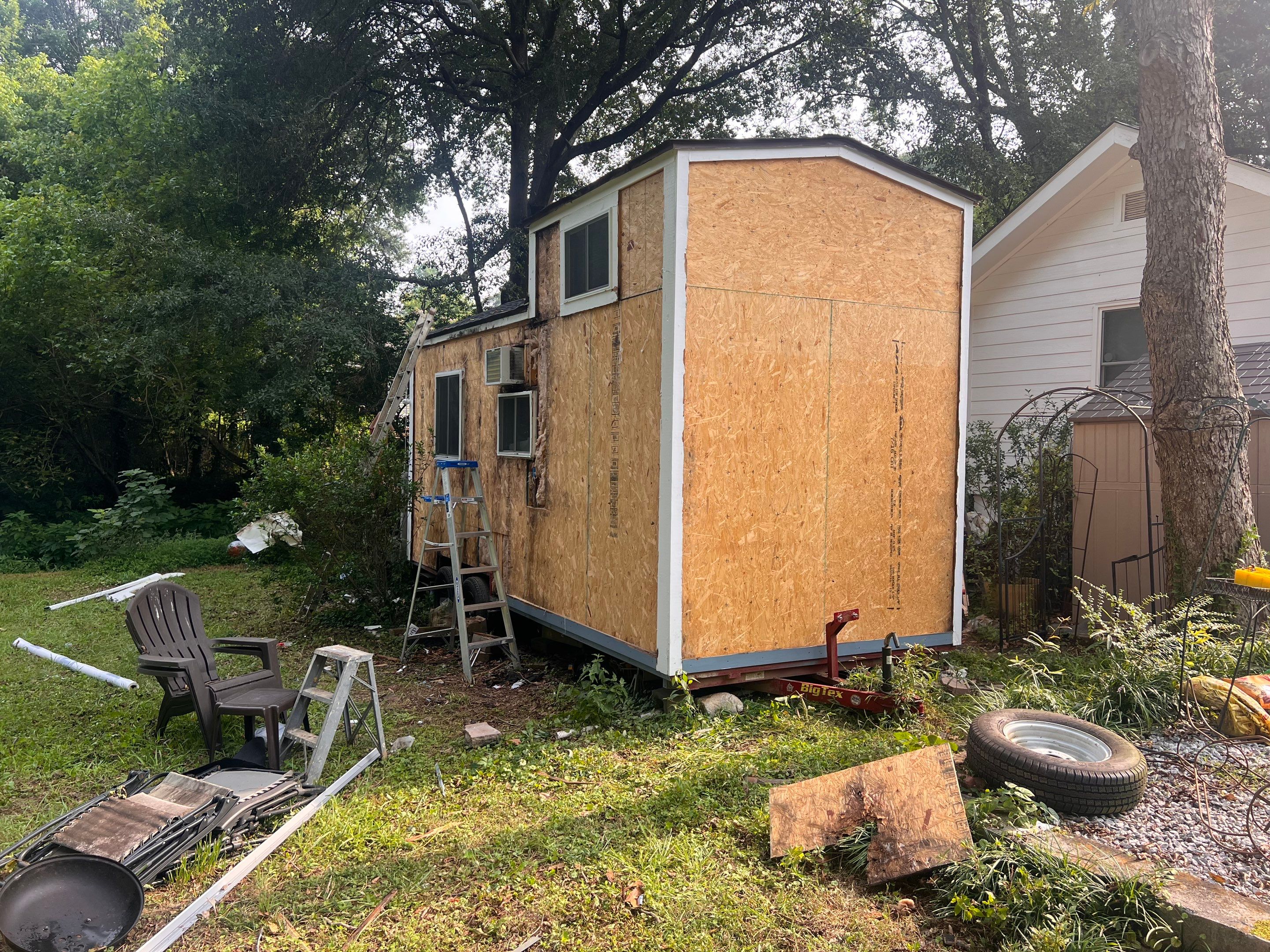 tiny home remodel- siding,paint,roofing by Nailed It Roofing & Remodeling LLC