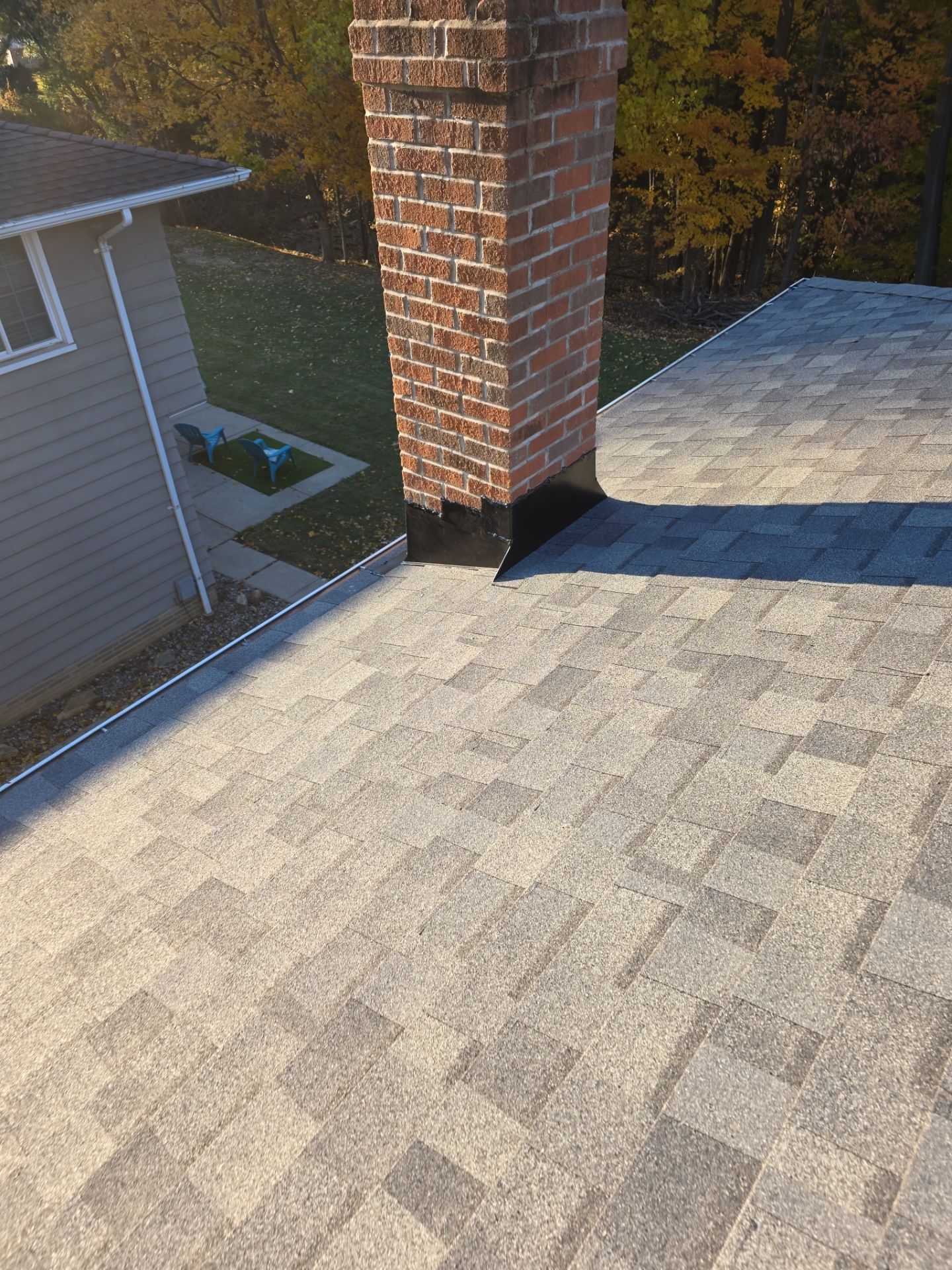 Shingle Roof Replacement by Absolute Roofing and Construction