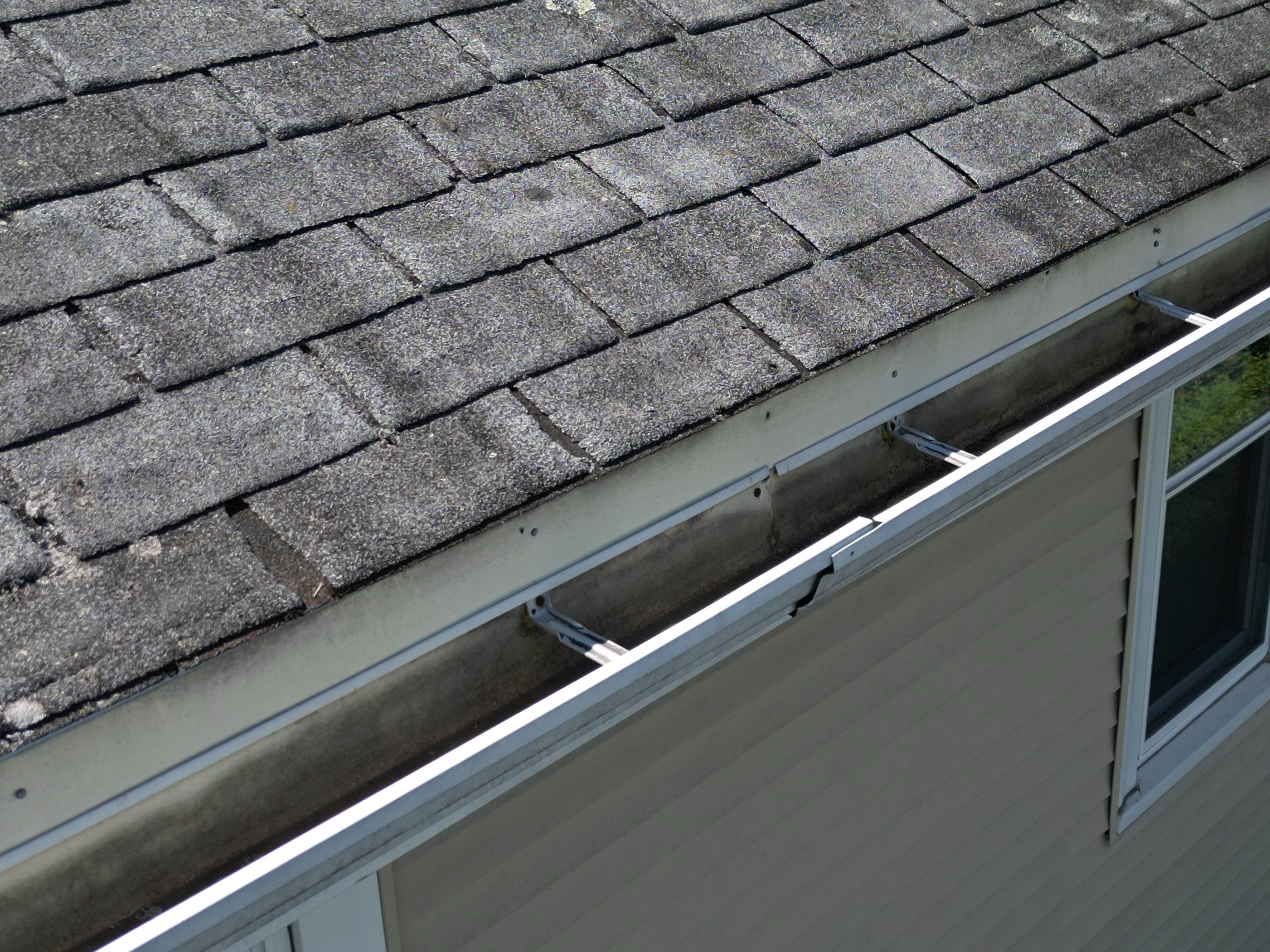 Roof Replacement with Skylight Flashing in Waltham, MA by Mighty Dog Roofing of Greater Middlesex County