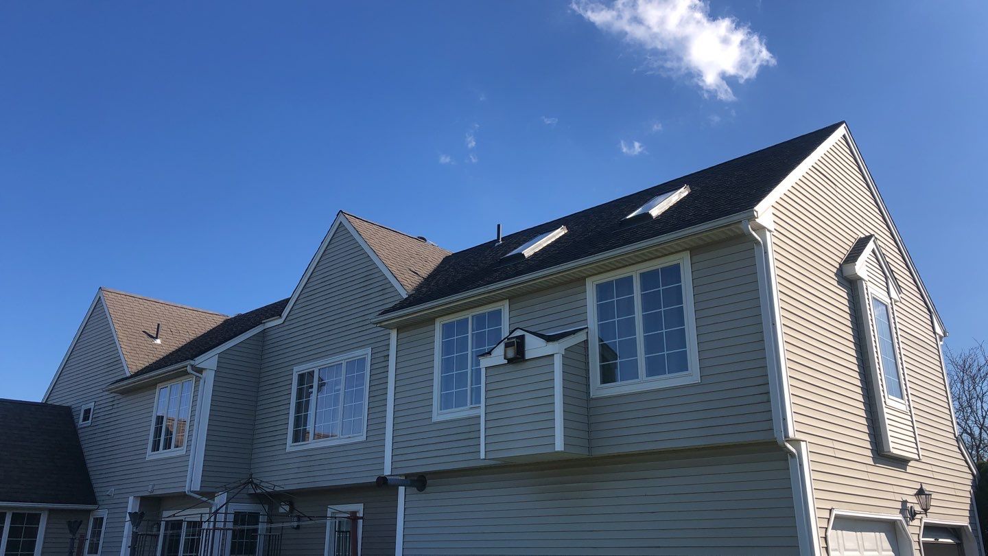 Commercial Roofing Installation using Owens Corning TruDefinition driftwood by A Plus Exterior