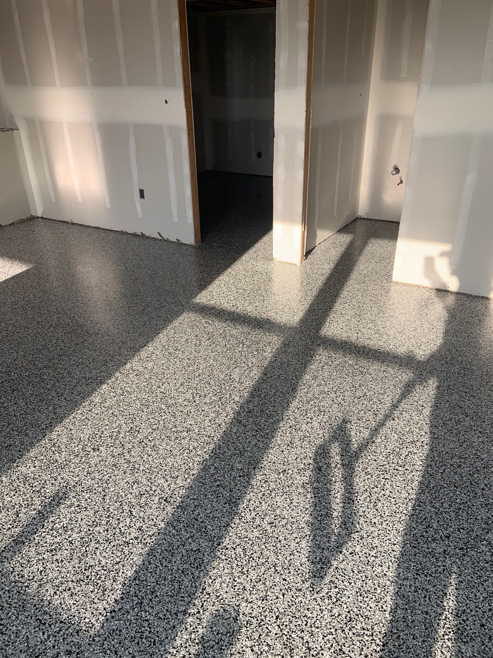 Basement Transformation using Domino by Croc Coatings, LLC