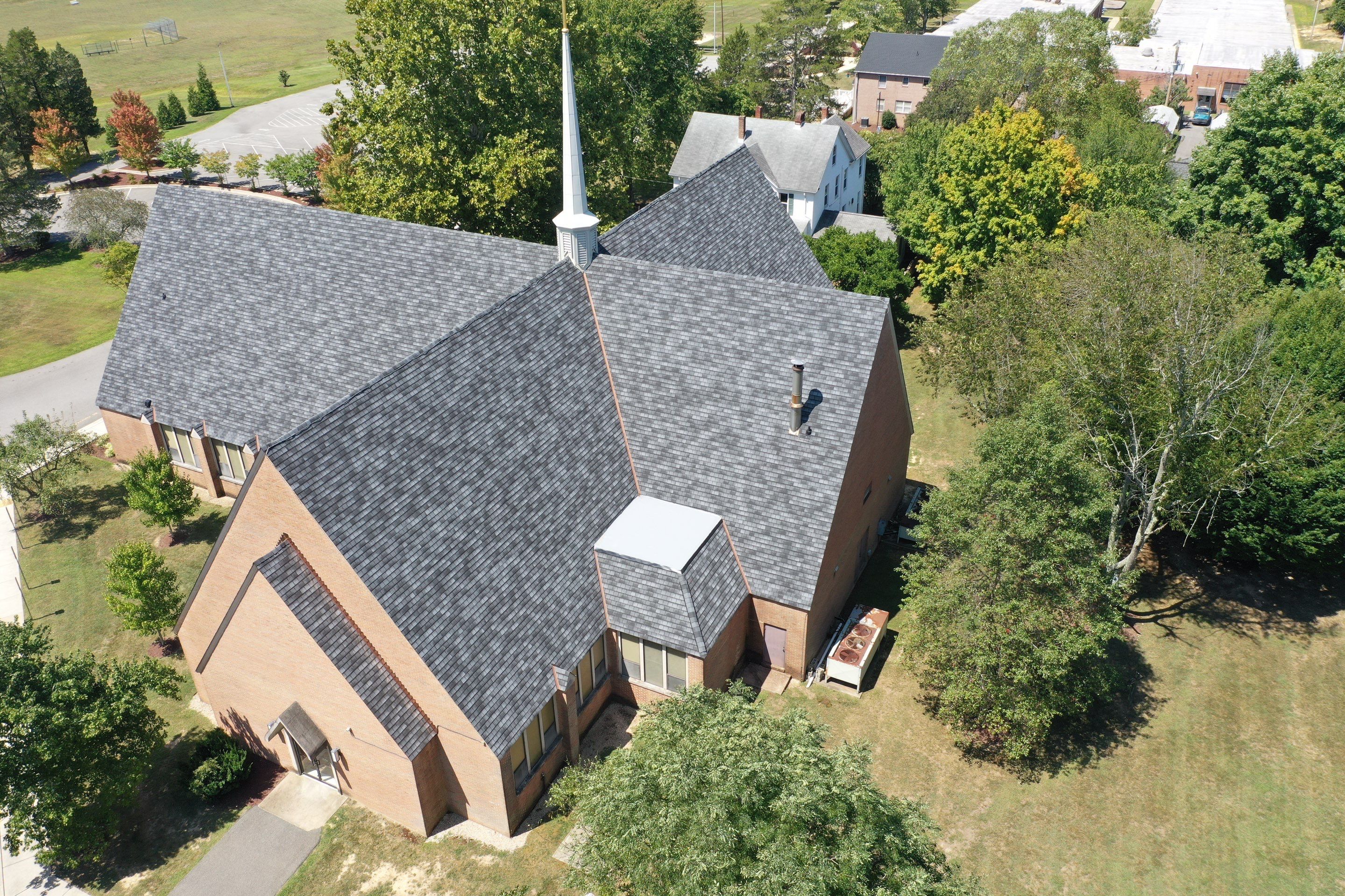 Roof Installation using Flat Roof Coating by ExteriorPros
