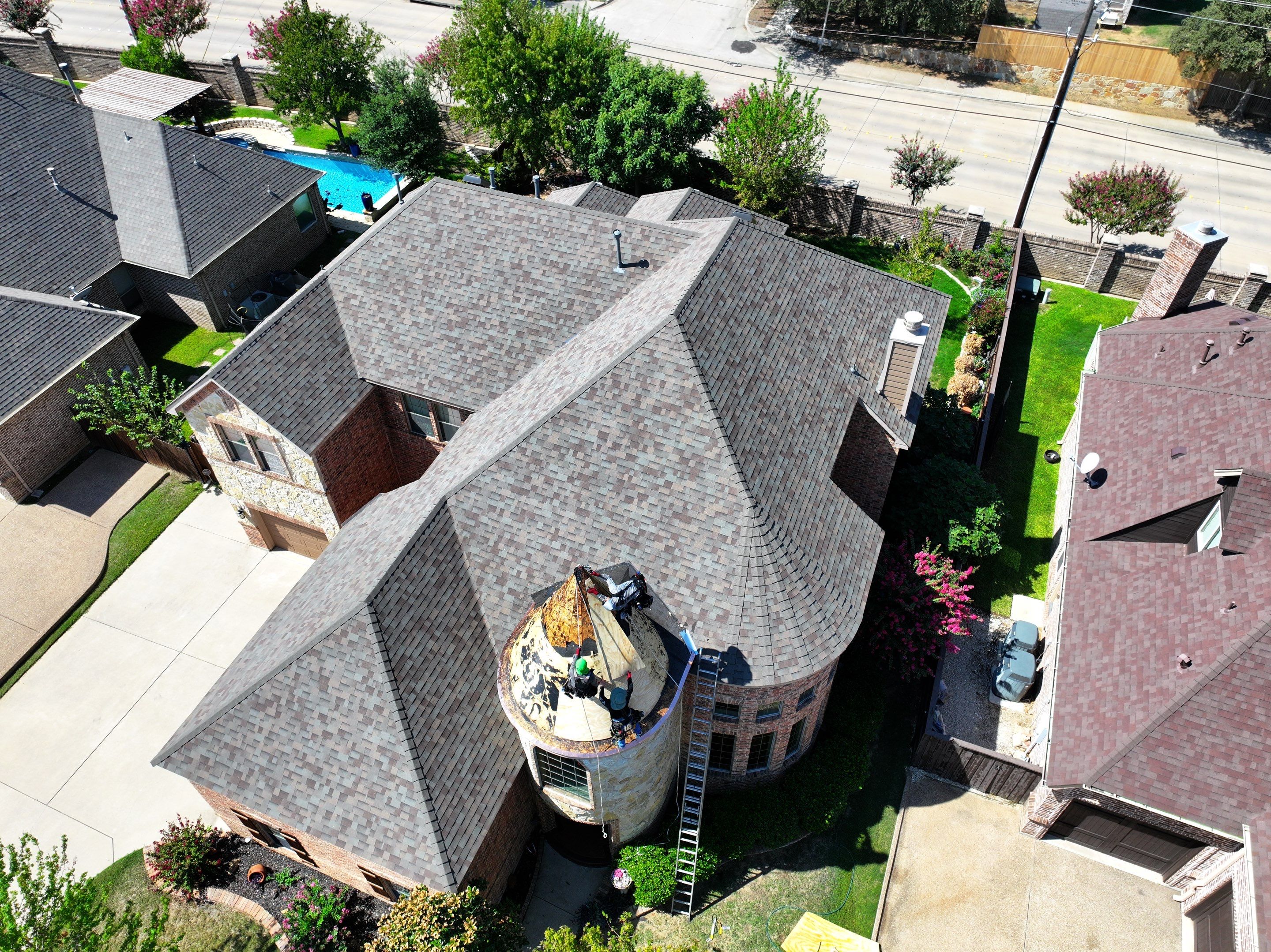 Installing Custom copper turret and Malarkey Vista Class 4 shingles Hail Damage Upgrade by Becker Roofing and Exteriors