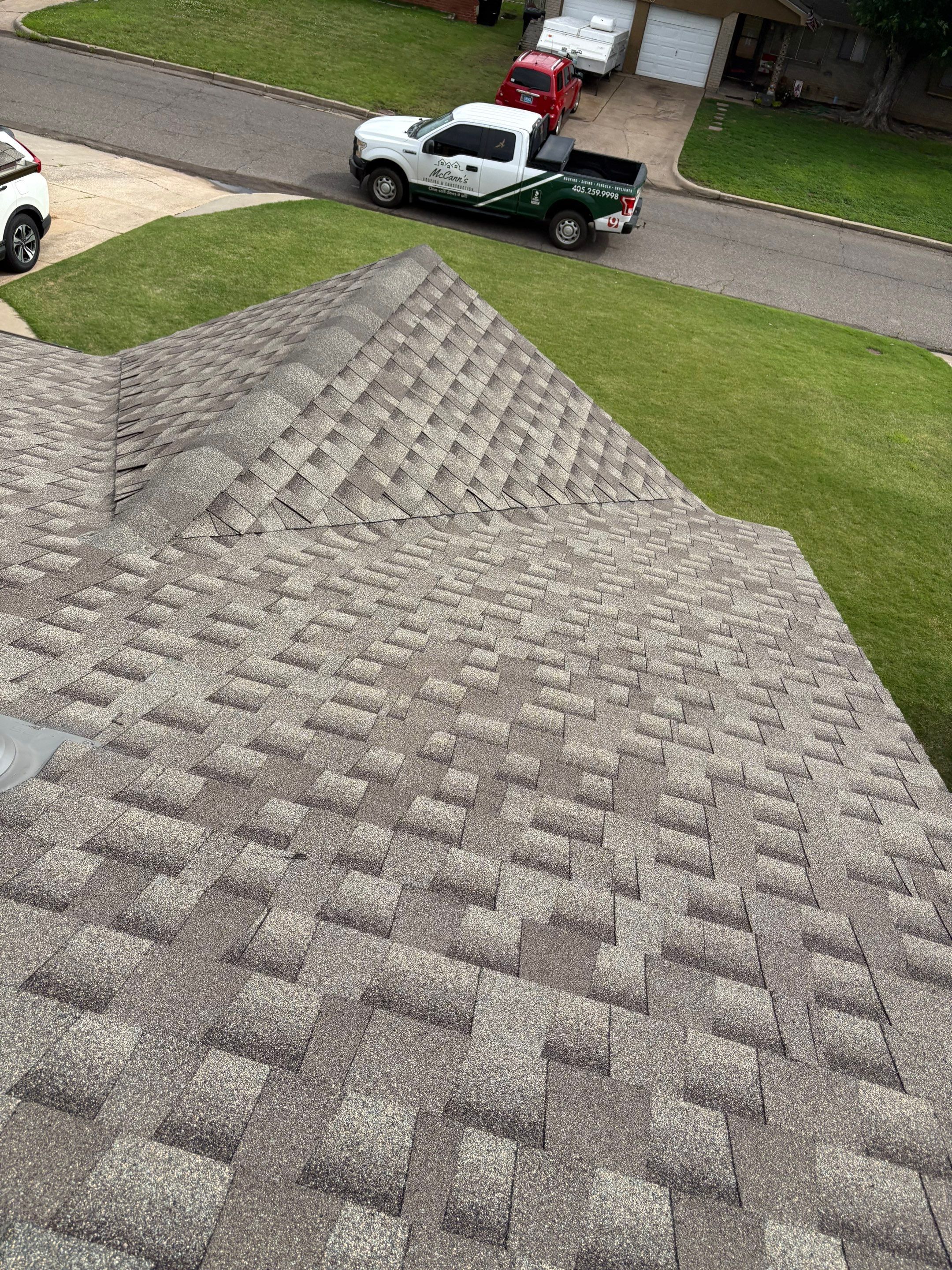 roof replacement & gutter installation in Moore by McCann's Roofing and Construction