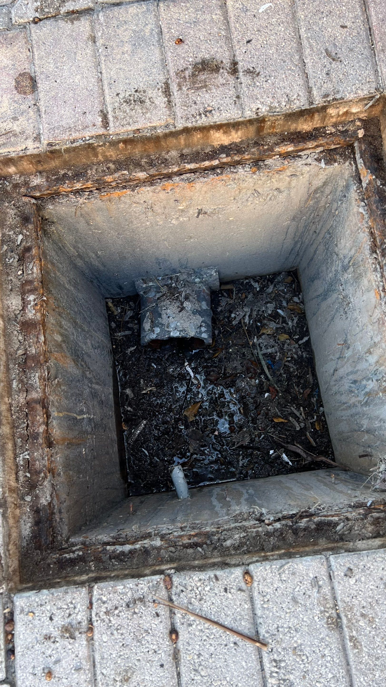 Catch Basin Cleaning After Hurricane Milton Naples Condo by APS Power & Water