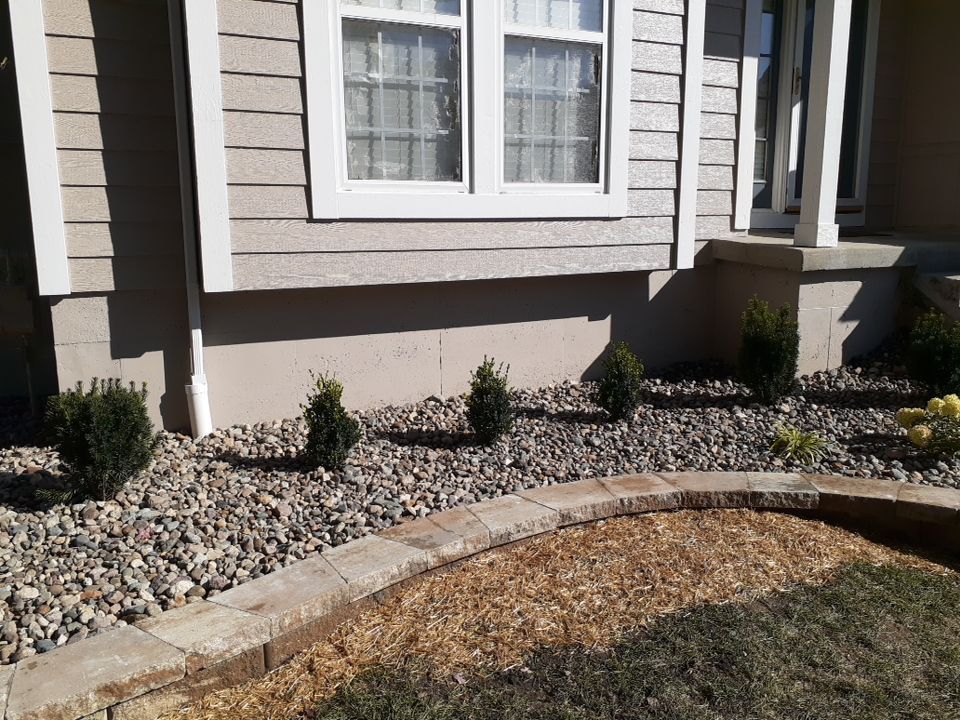Front Yard Elevated landscape by LAND ESCAPES LLC
