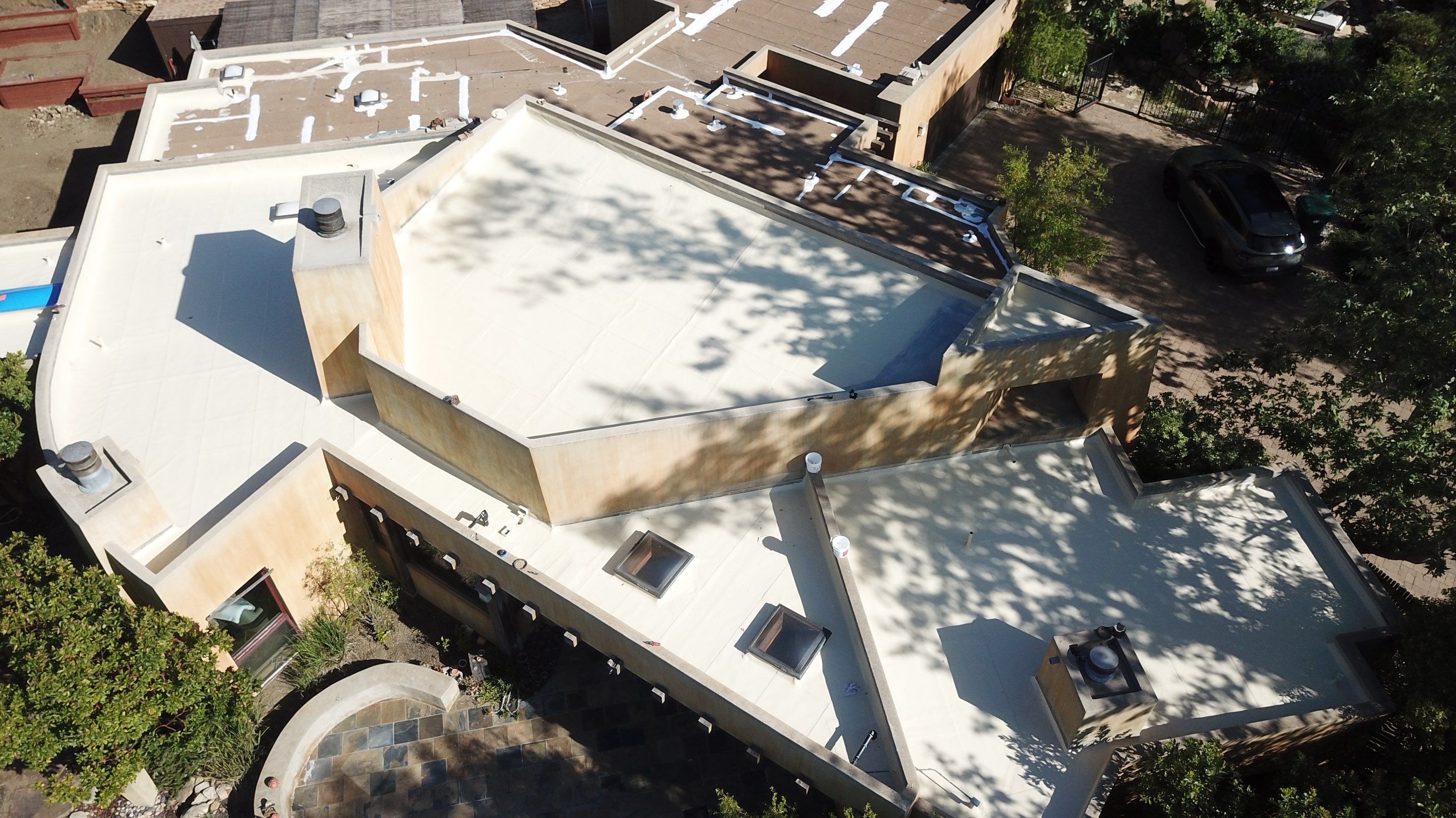 Tan Silicone Applied to a Stunning Residential Property in Calabasas by Hull Brothers Roofing