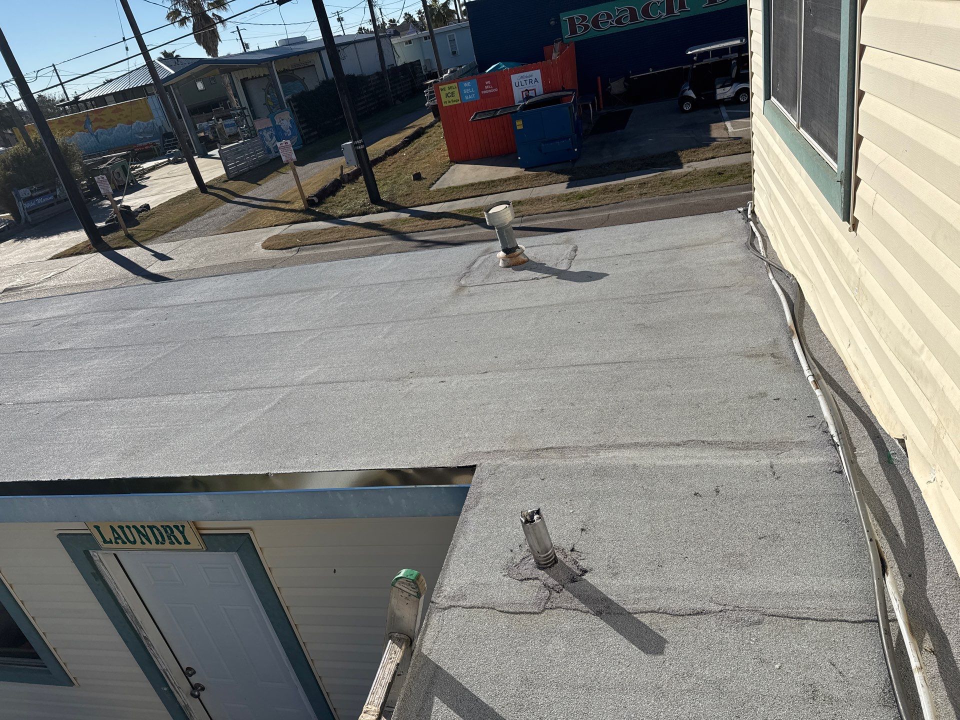 Mustang Island Flat Top by Bayfront Roofing and Construction