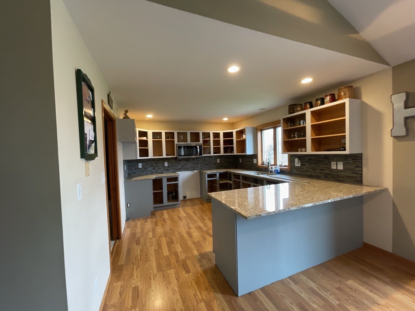 Kitchen cabinet repaint by Cutting edge painting 