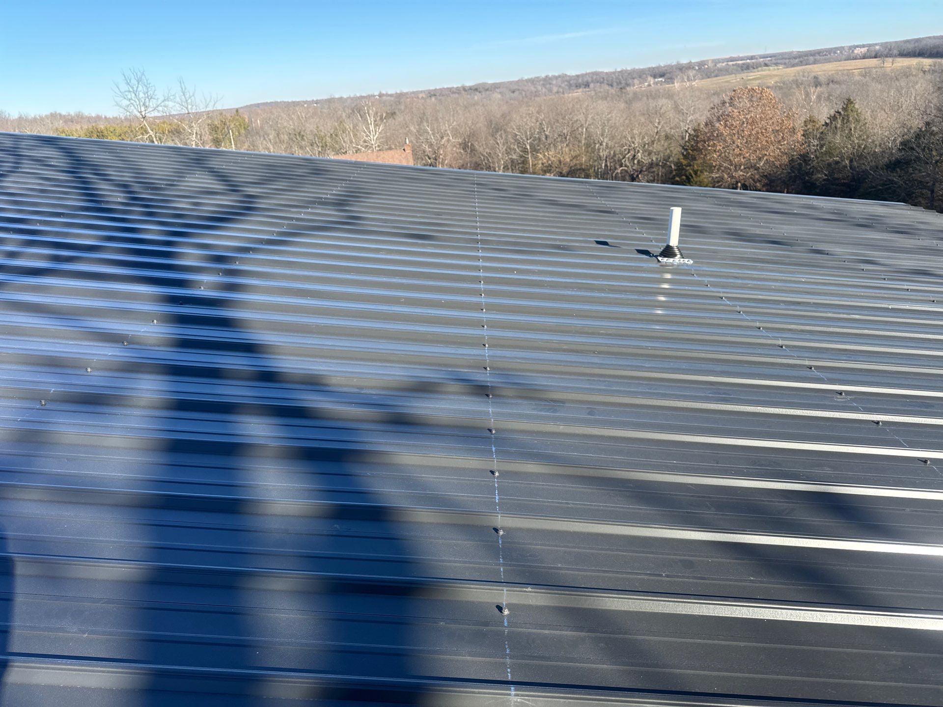 Residential Roofing Install - 29 Gauge G-Rib Metal - Color Black by Titan Commercial & Residential Roofing