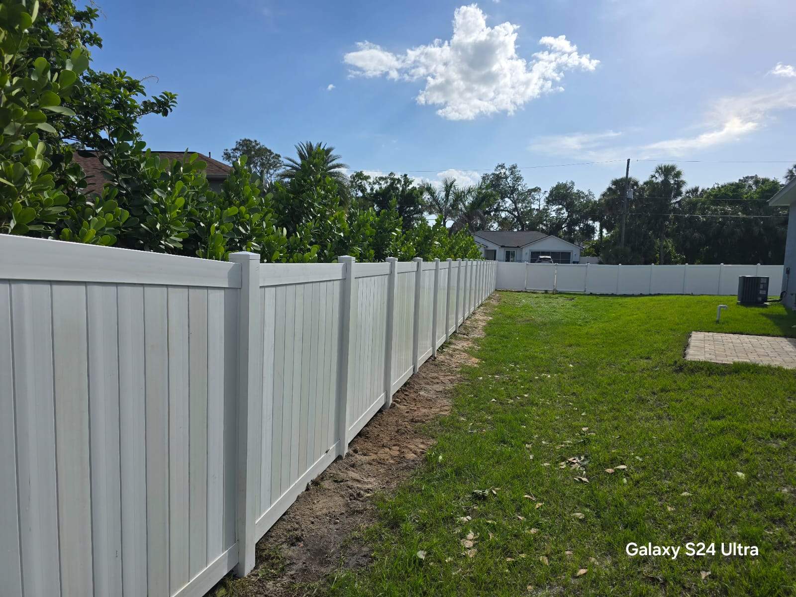 Residential White Vinyl Privacy Fence Installation in North Port by True Fence LLC