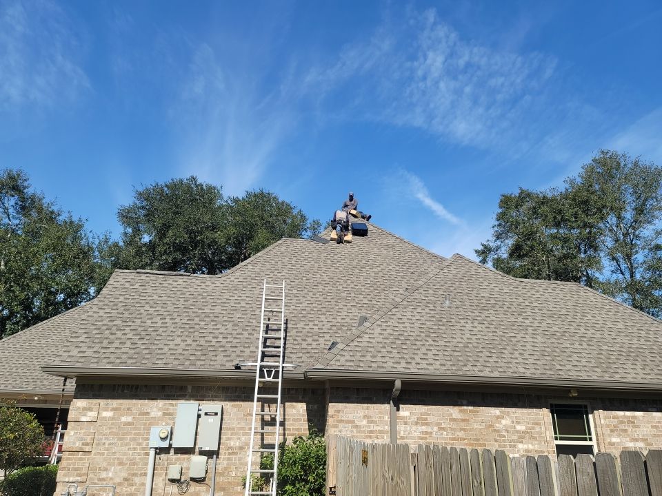 Residential Roofing Installation using Roof Replacement by American Roofing & Construction LLC
