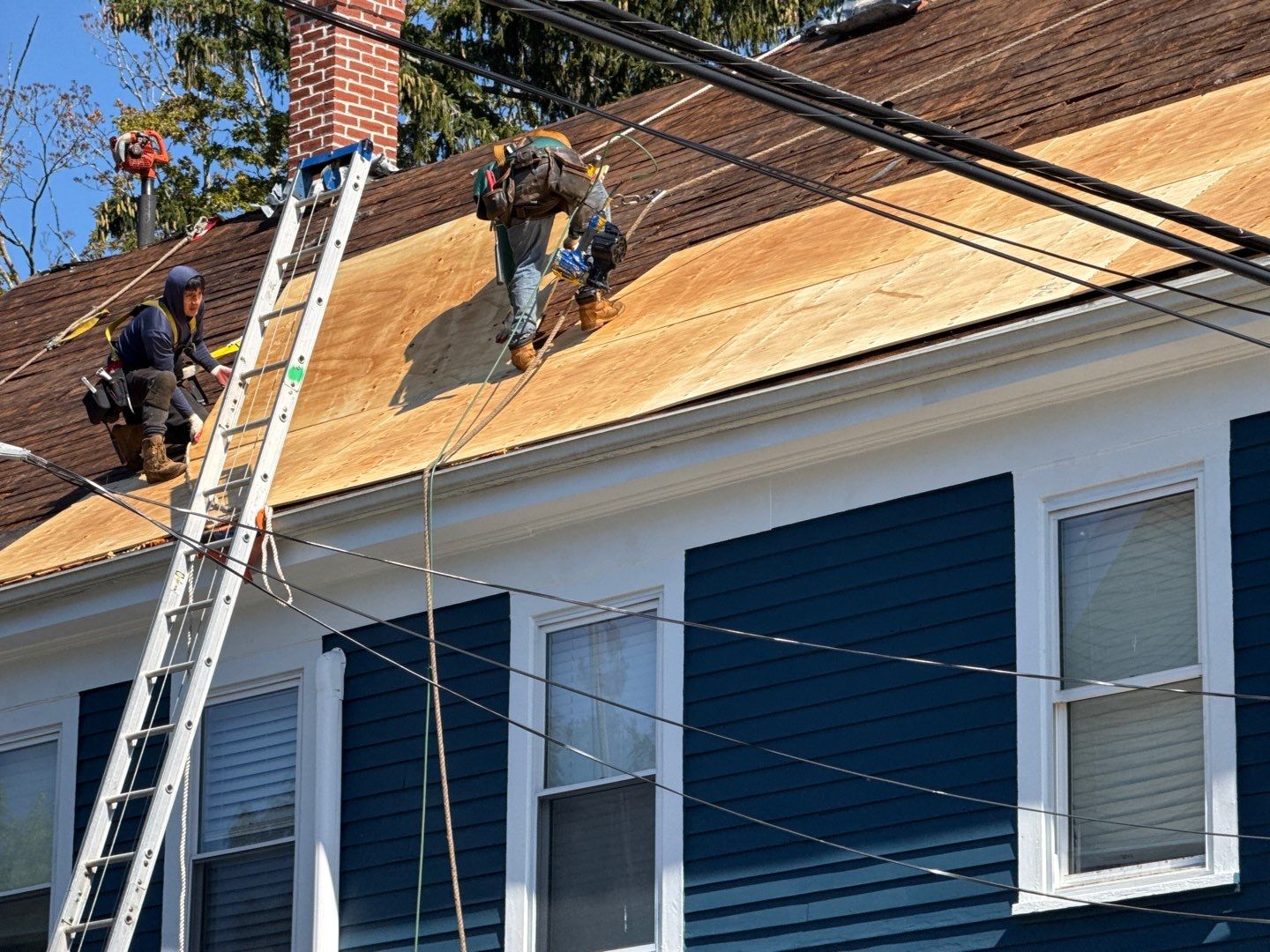 Half Roof Replacement for Solar Installation – Townhouse with New Plywood Decking by Sensible Home Solutions