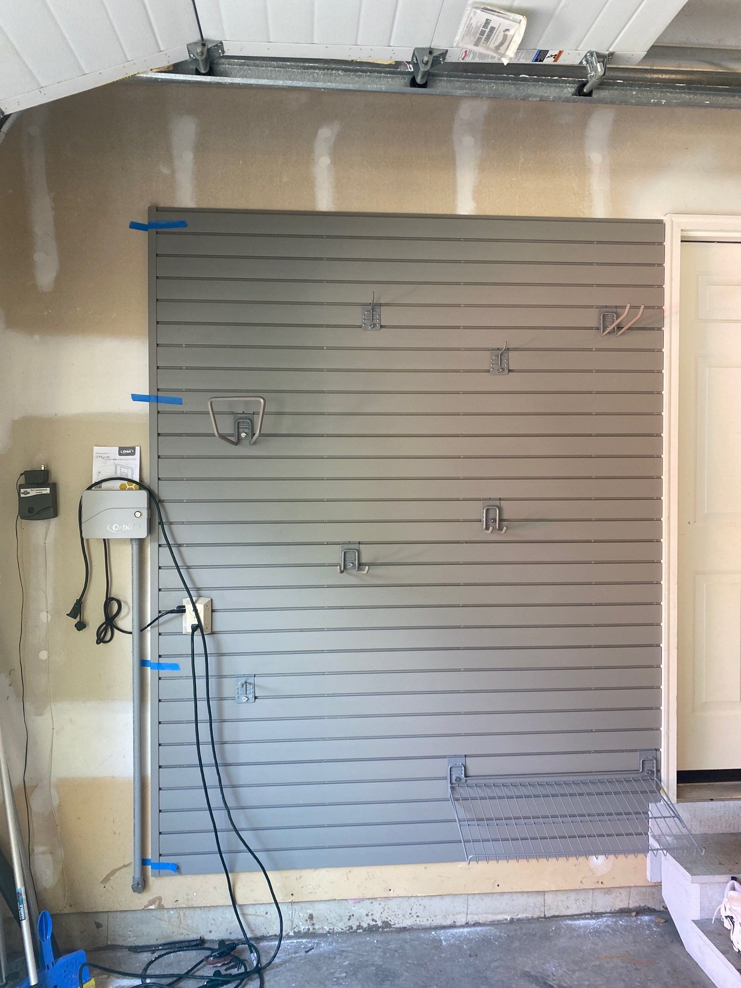 Michael J. adds wall storage and ceiling rack to his garage! by Banner Garage