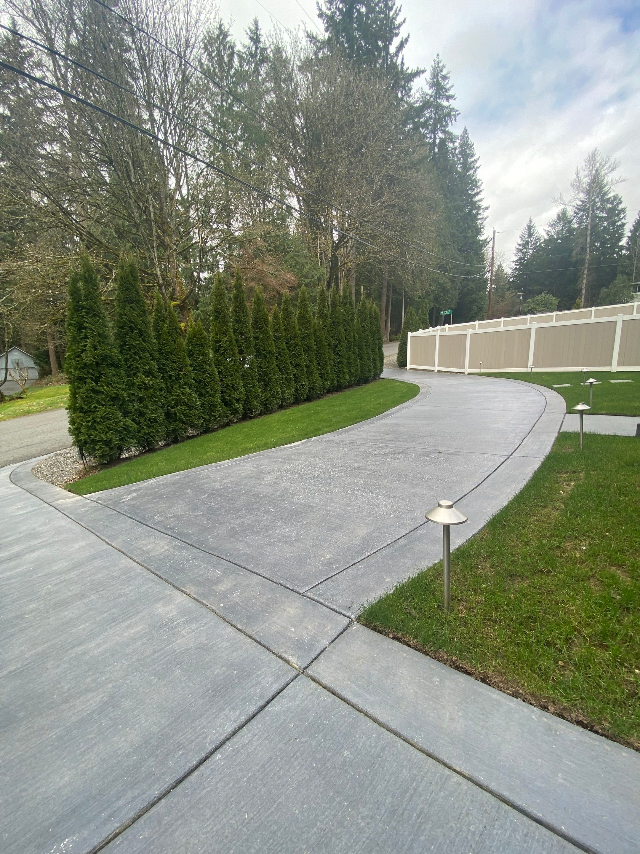 Melanie | Concrete Driveway  by Jireh Asphalt & Concrete Inc 