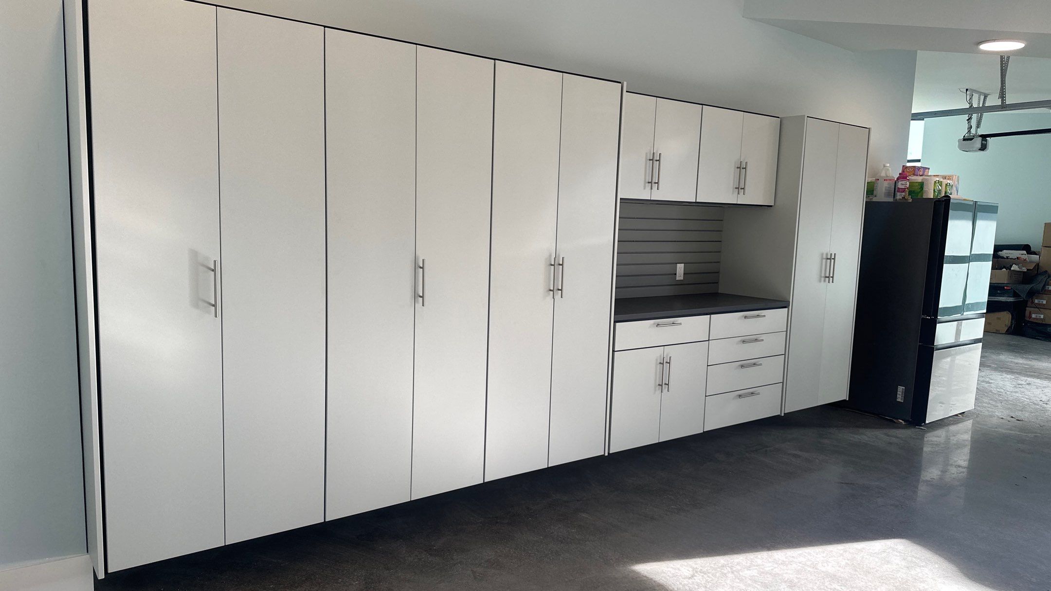 Bryon V. upgrades garage with cabinets and heavy duty slatwall by Banner Garage