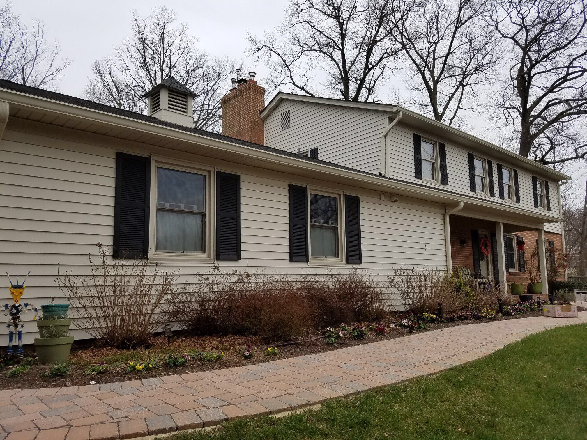 Siding and Roof Replacement by American Home Contractors