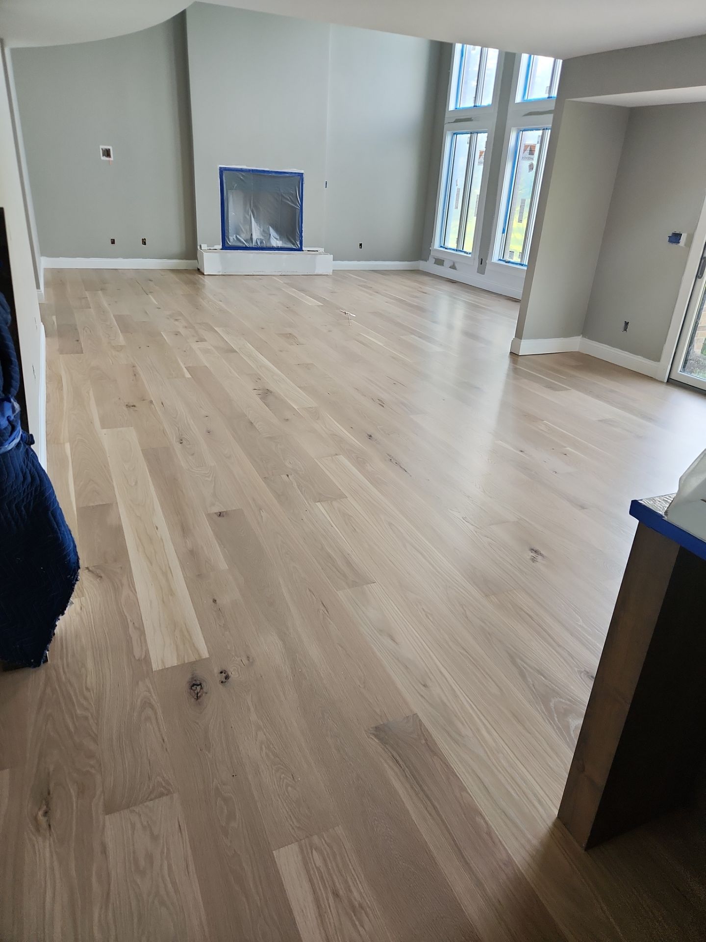  7 inch wide engineered  White Oak site sand and finish by Ann Arbor Hardwoods 