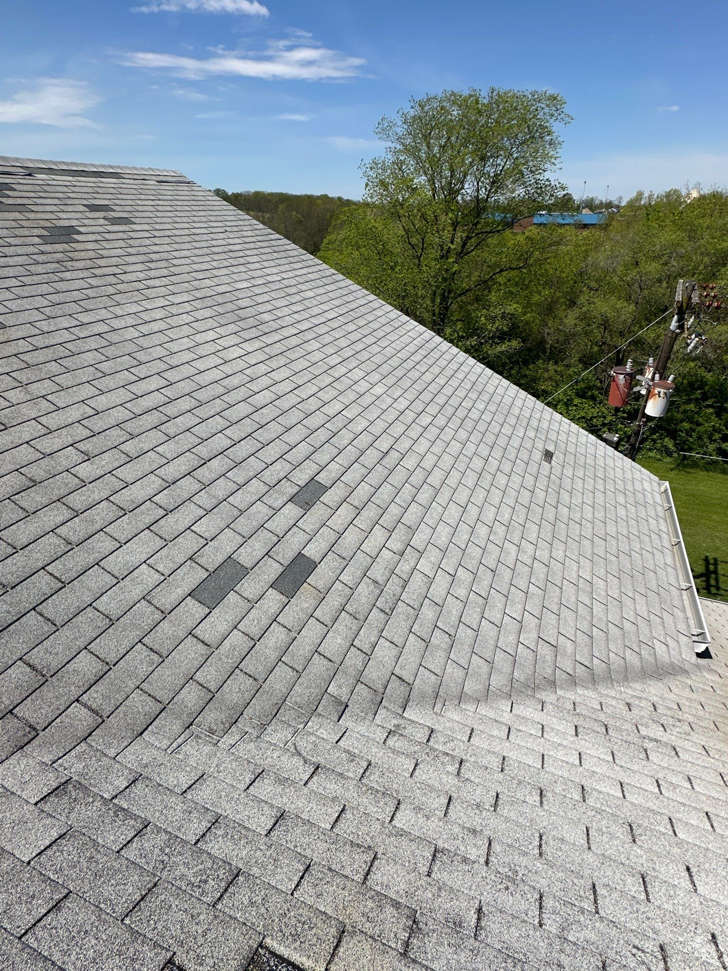 Commercial Roofing Installation using Performance Shingles by Mr. Roofer