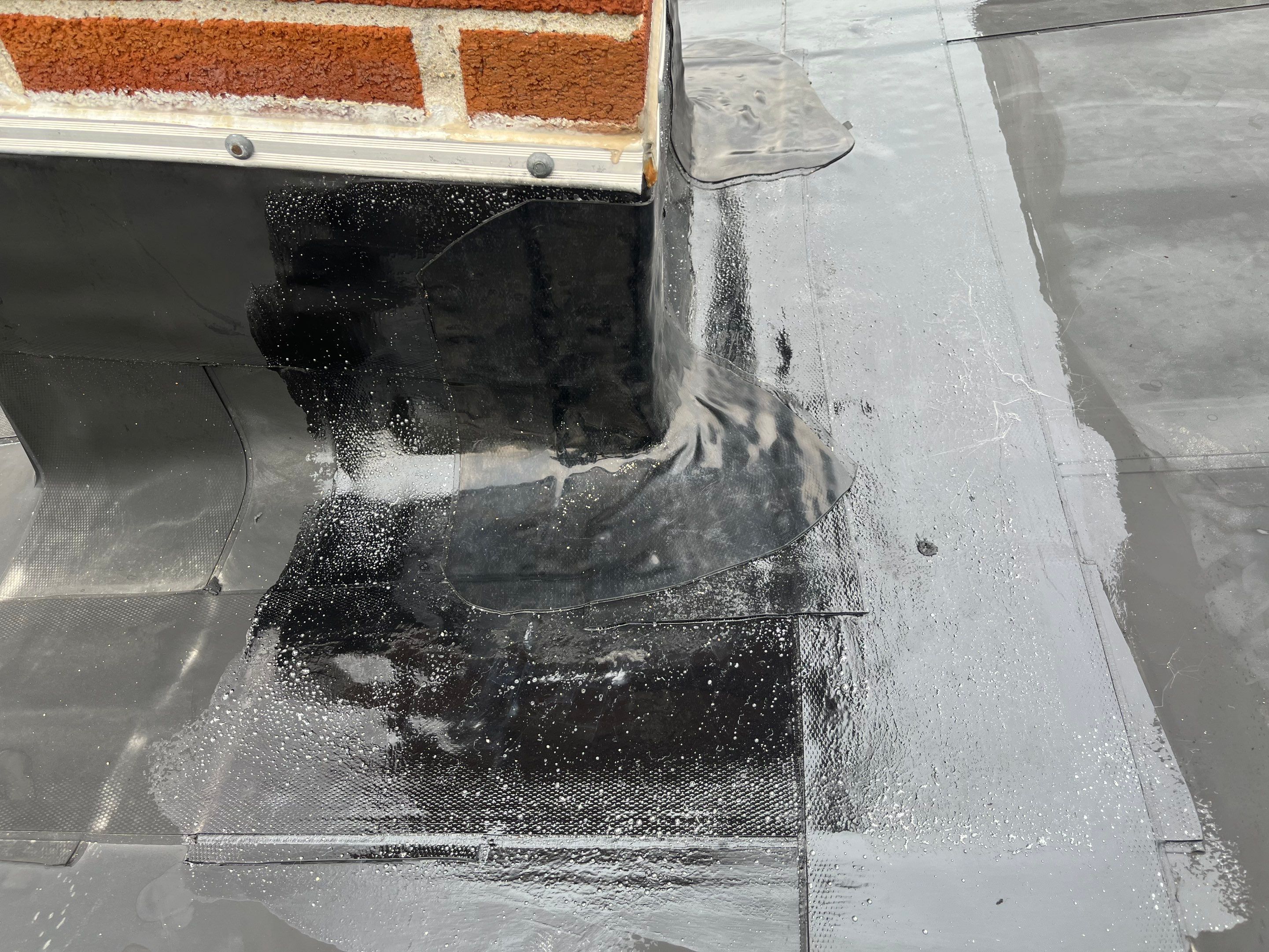 Rubber Roof Repair W/Chimney Reflash by Tall pine roofing