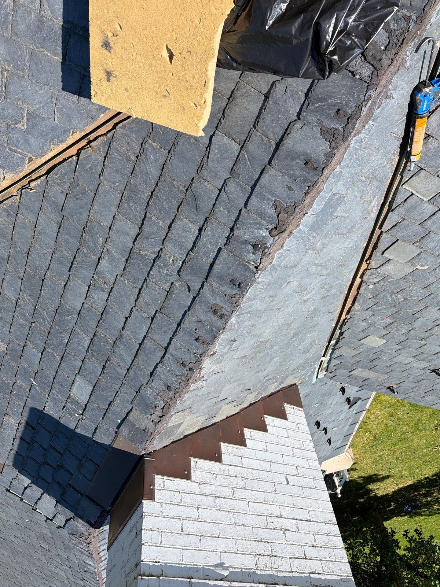 Historical Slate Roof Repair and Chimney Flashing Restoration in West Point by Cade Construction