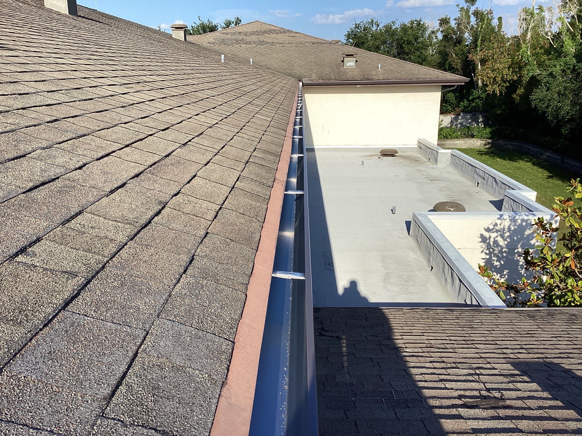 Musket Brown Seamless Gutters using Musket Brown Seamless Gutters in Capen Coral FL by Gutter Professors