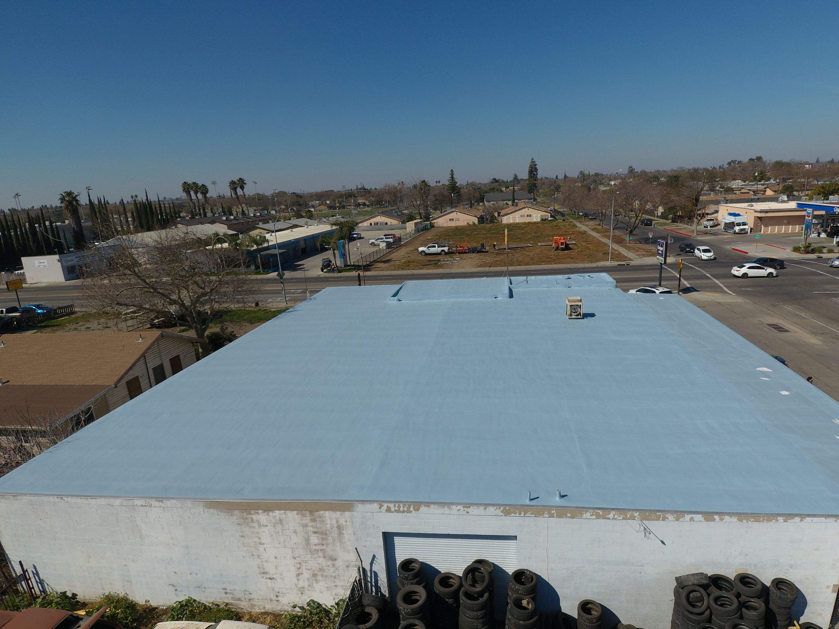 Spray foam and coatings using Conklin Benchmark/PUMA XL coatings and spray foam by Straight Edge Roofing Inc