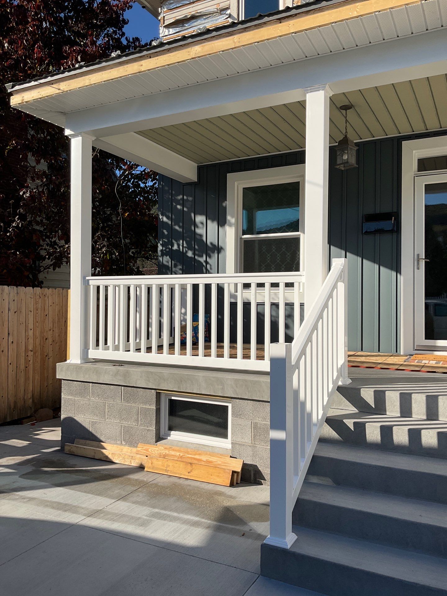 Charcoal Metal Roof & Blue Siding — A Refreshing New Look by Esh Builders
