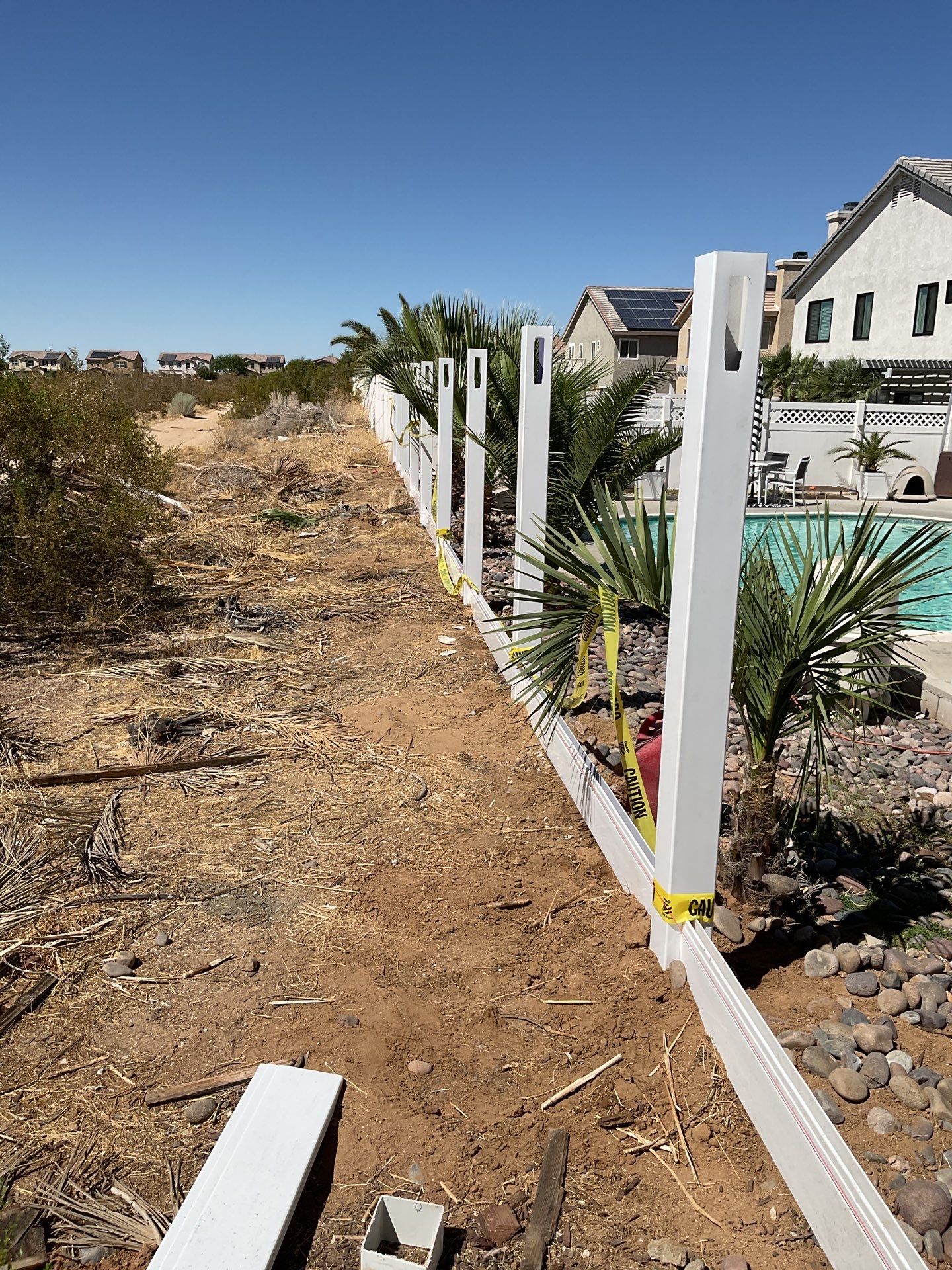 Lattice Vinyl with Privacy Vinyl Fence by Fence Guys Inc.