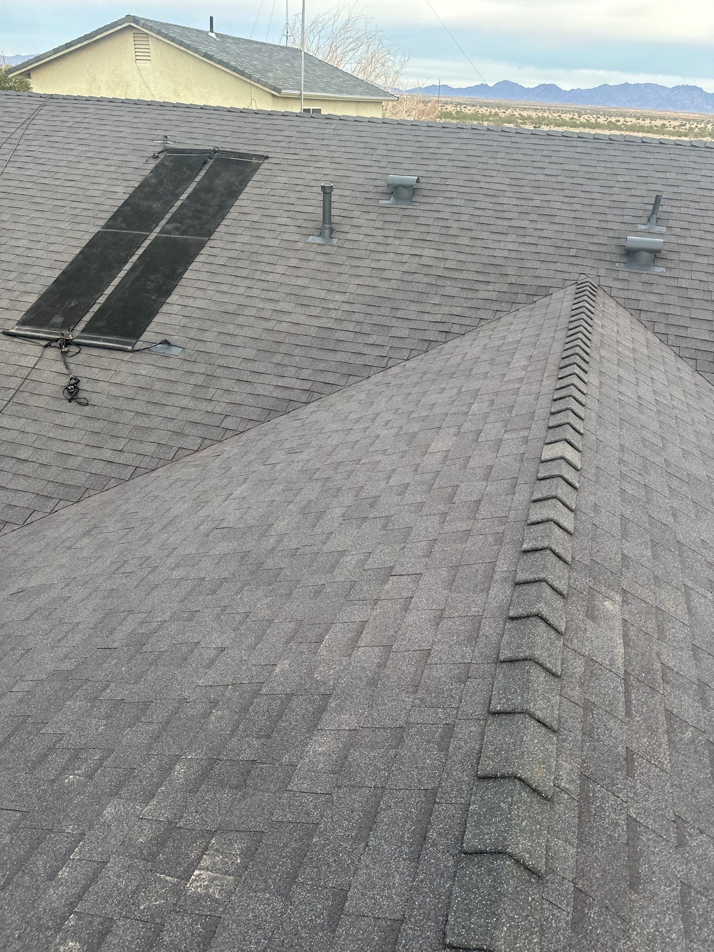 Storm Grey Shingles by Reimagine Roofing