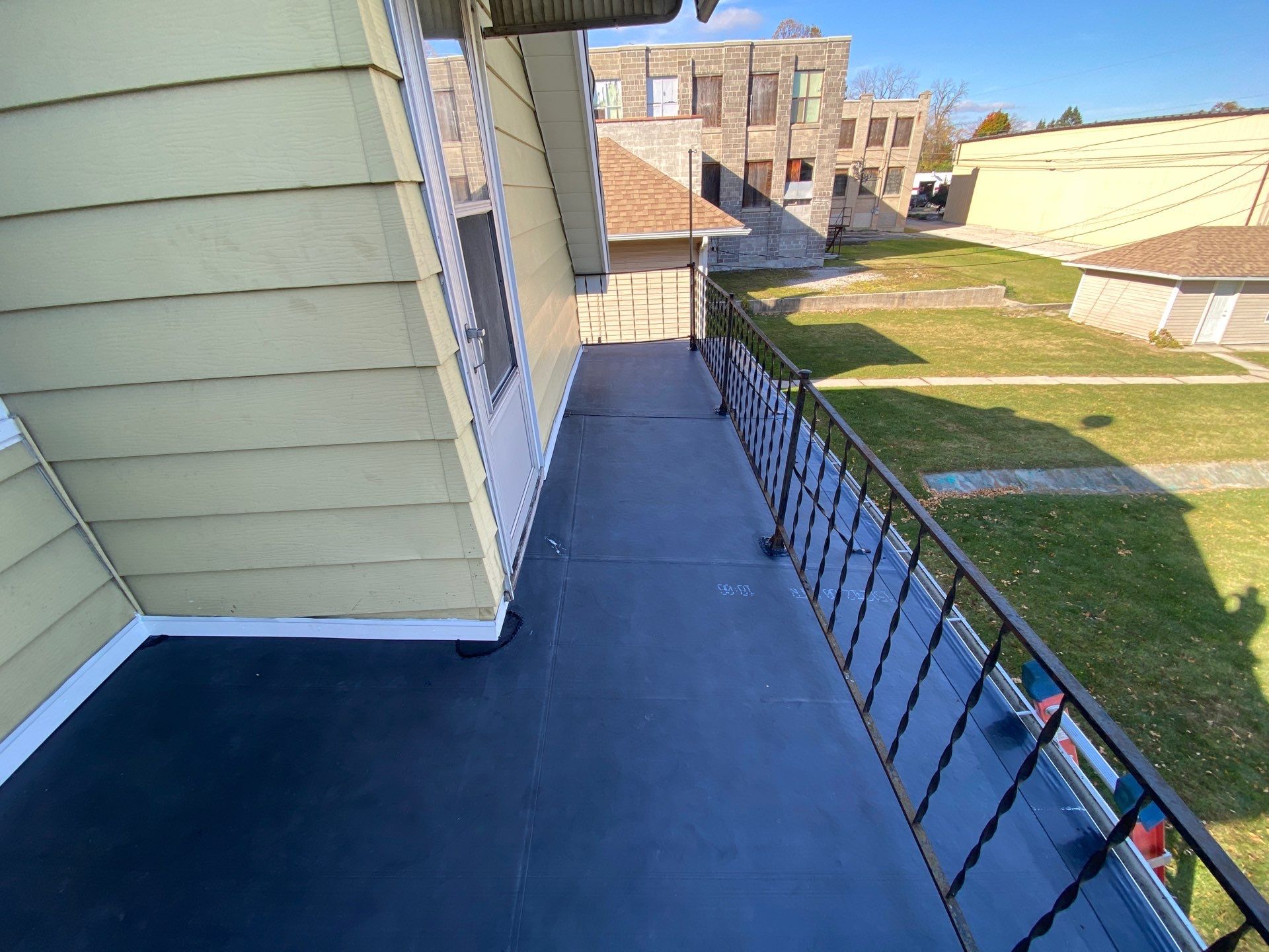 Flat Roof Porch with 60mil EPDM Rubber by Gellings Roofing & Siding