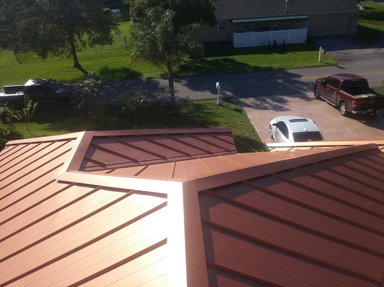 Residential Roofing Installation using 1" Nail strip metal roof by BLUES BROTHERS CONSTRUCTION CORP