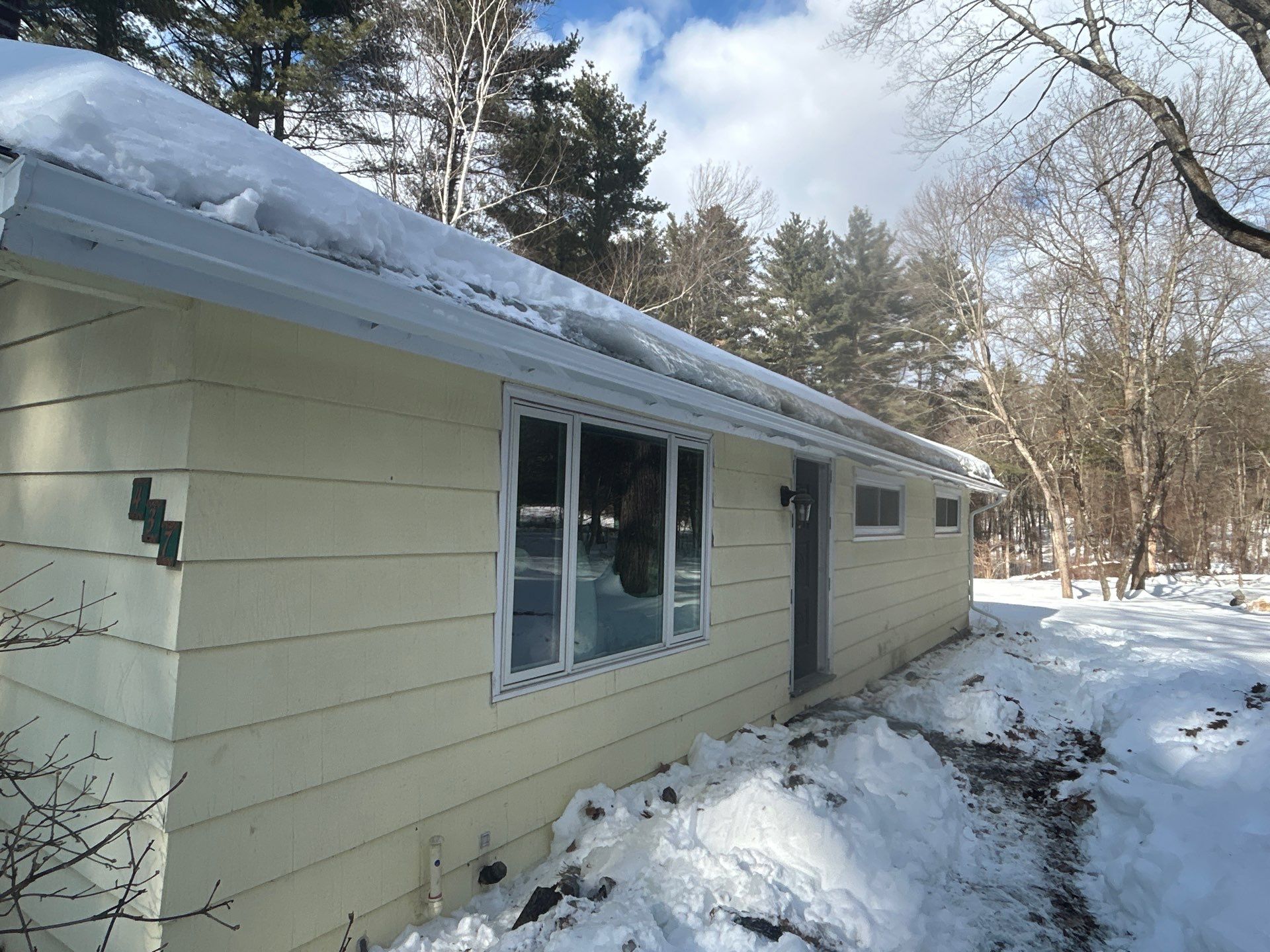 Gutter Installation Project in Stow by Mighty Dog Roofing of Greater Middlesex County