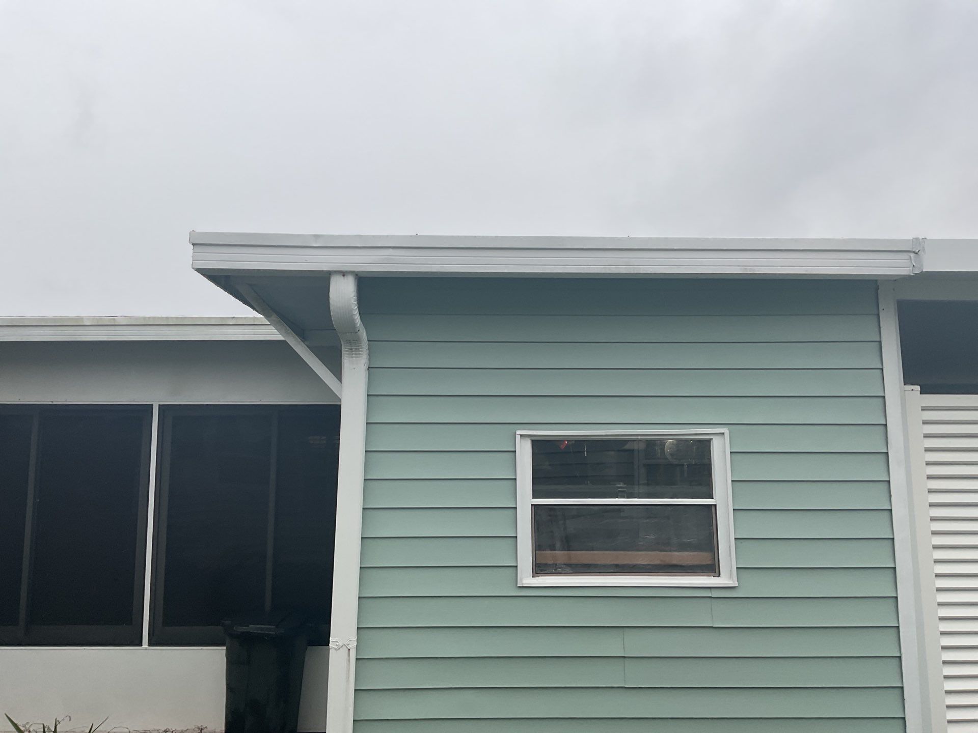 Cleaning Gutters in Fort Myers FL by Gutter Professors