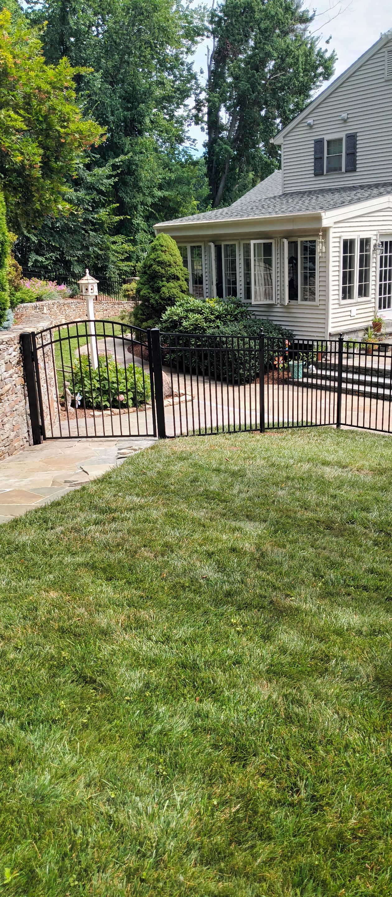 New Black Aluminum fence with matching gates by DiGiorgi Roofing and Siding Inc