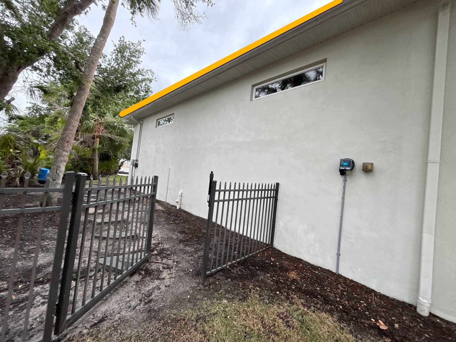 6-Inch White Seamless Gutters Installation in Siesta Key FL by Gutter Professors