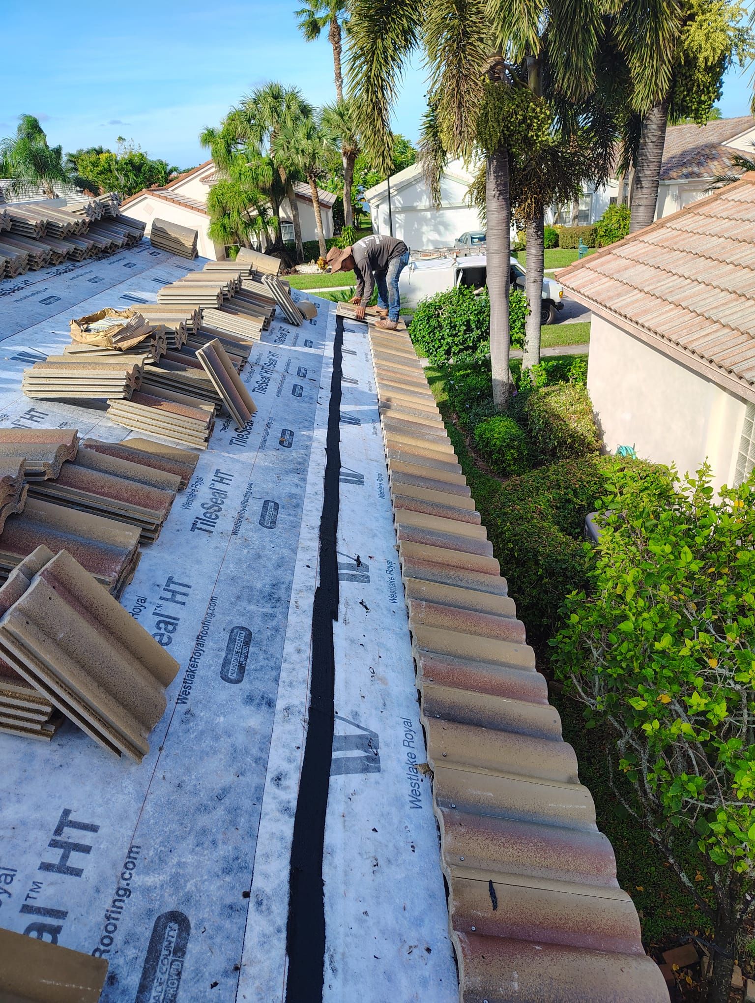 Concrete Tile Roof Replacement and Wood Decking Repair in Boca Raton by Aastro Roofing