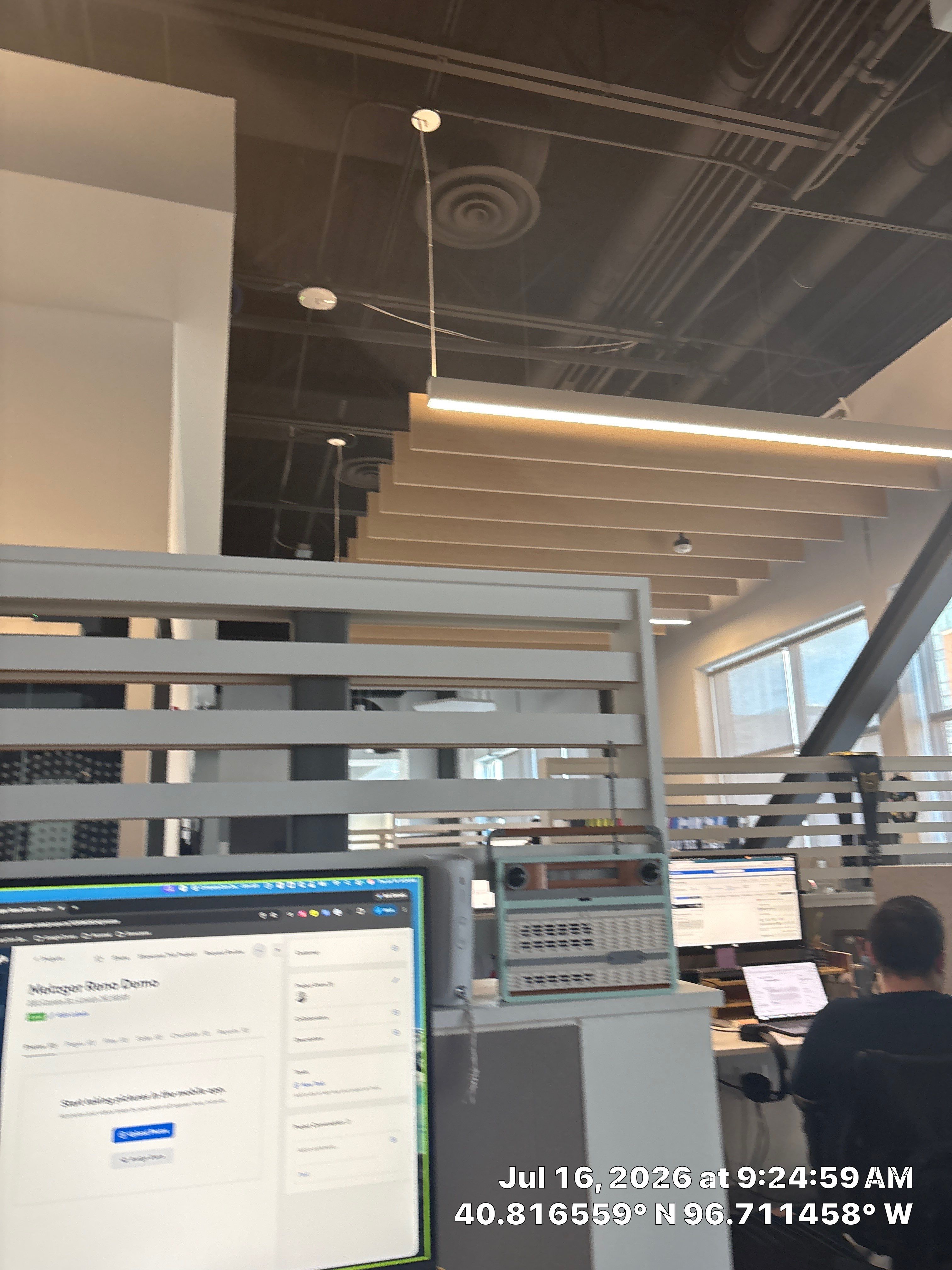 Modern Office Interior Renovation and Acoustic Baffles in Lincoln by CompanyCam Sales Demo