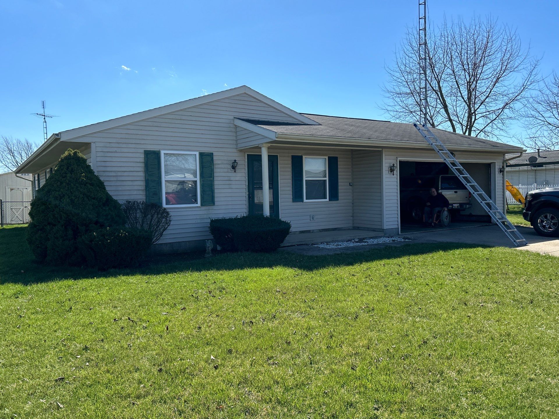 Storm Damage Residential Roof and Siding Installation by WIW Enterprises Inc