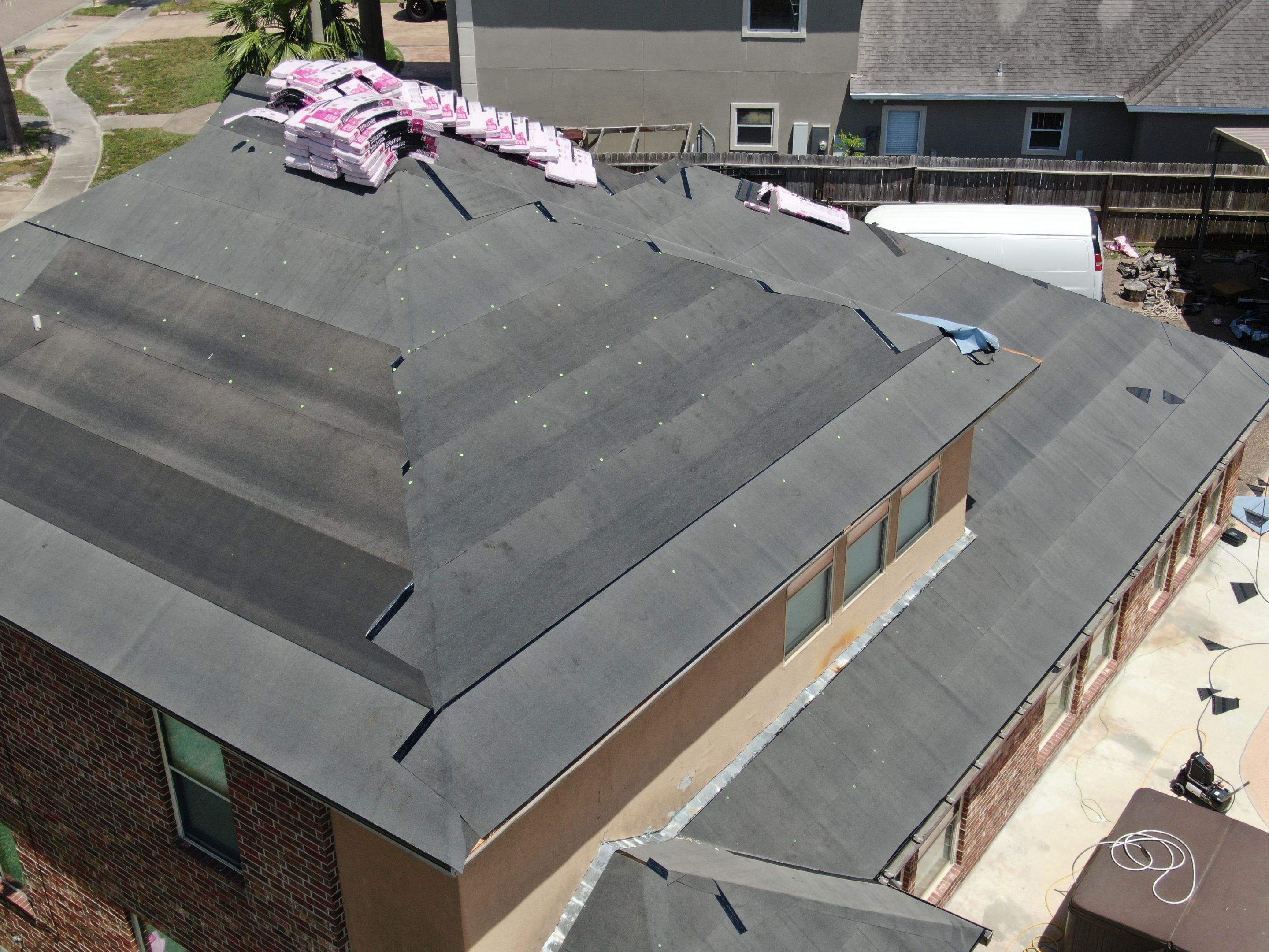 Flashing Stucco above the Roof by Bayfront Roofing and Construction