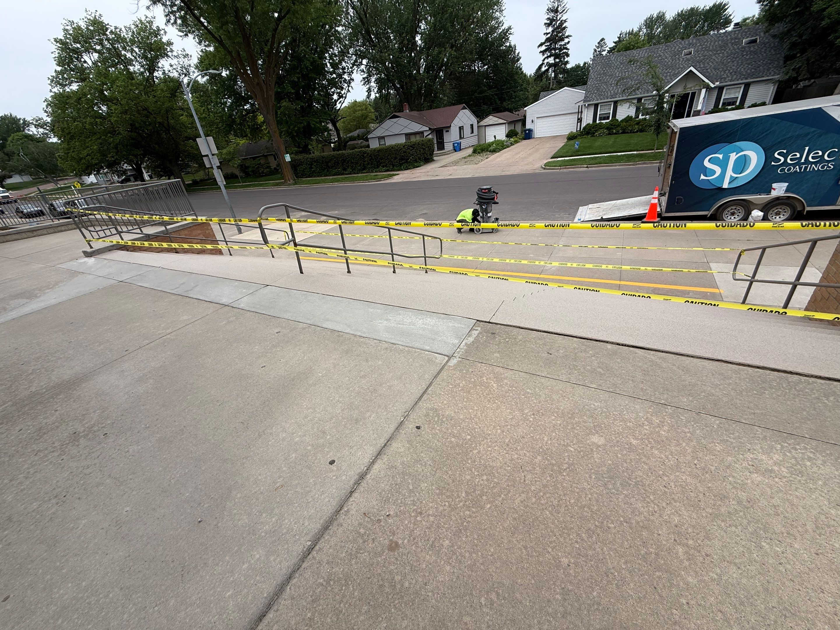 Concrete Stair Repair and Protective Coating in Sioux Falls by Select Painting, Coatings & Garage Cabinets
