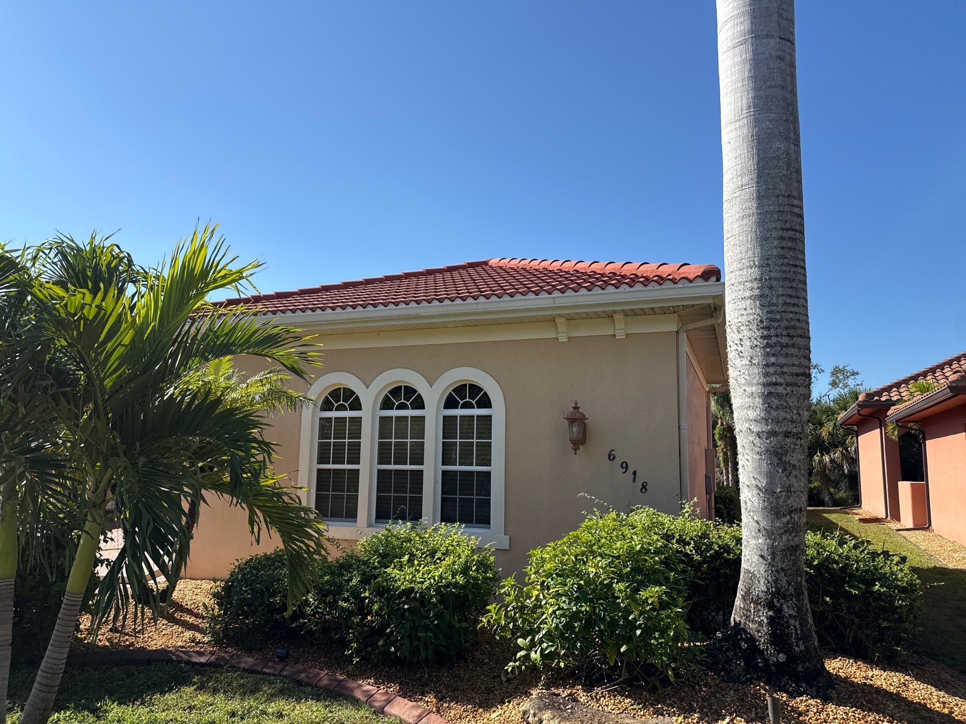 Tile Roof Cleaning & Oil Stain Removal | Tara River Place, Bradenton FL by Sunshine AquaWash