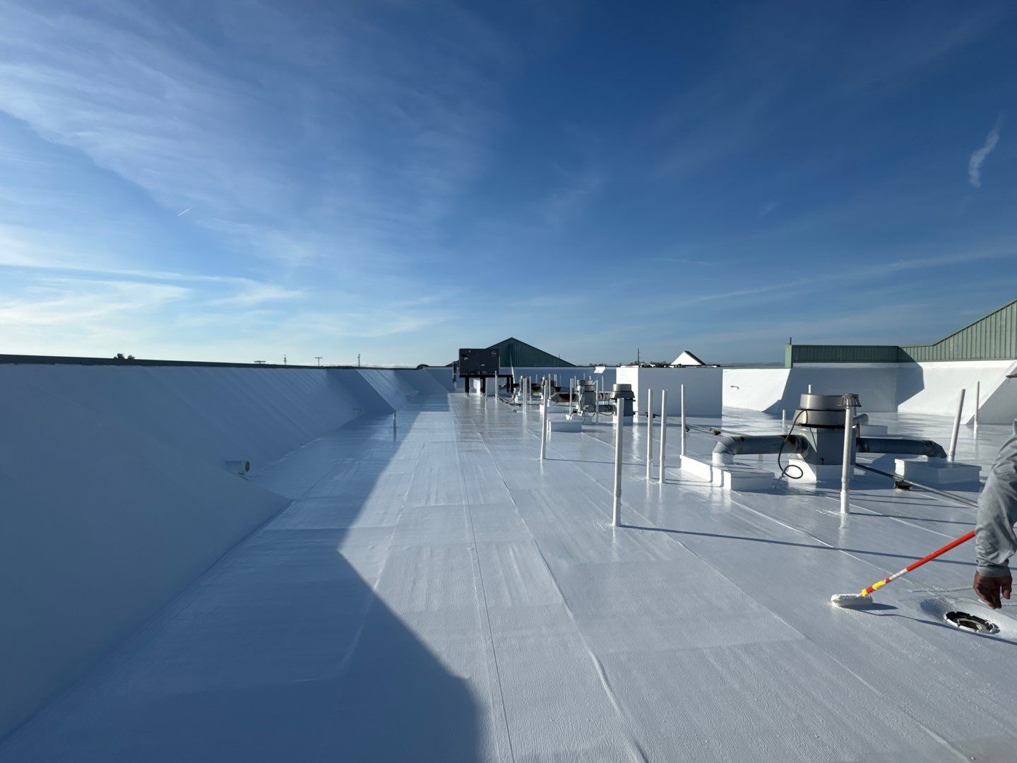 Commercial White Silicone Roof Coating for Hotel in Oldsmar by CES Roofing