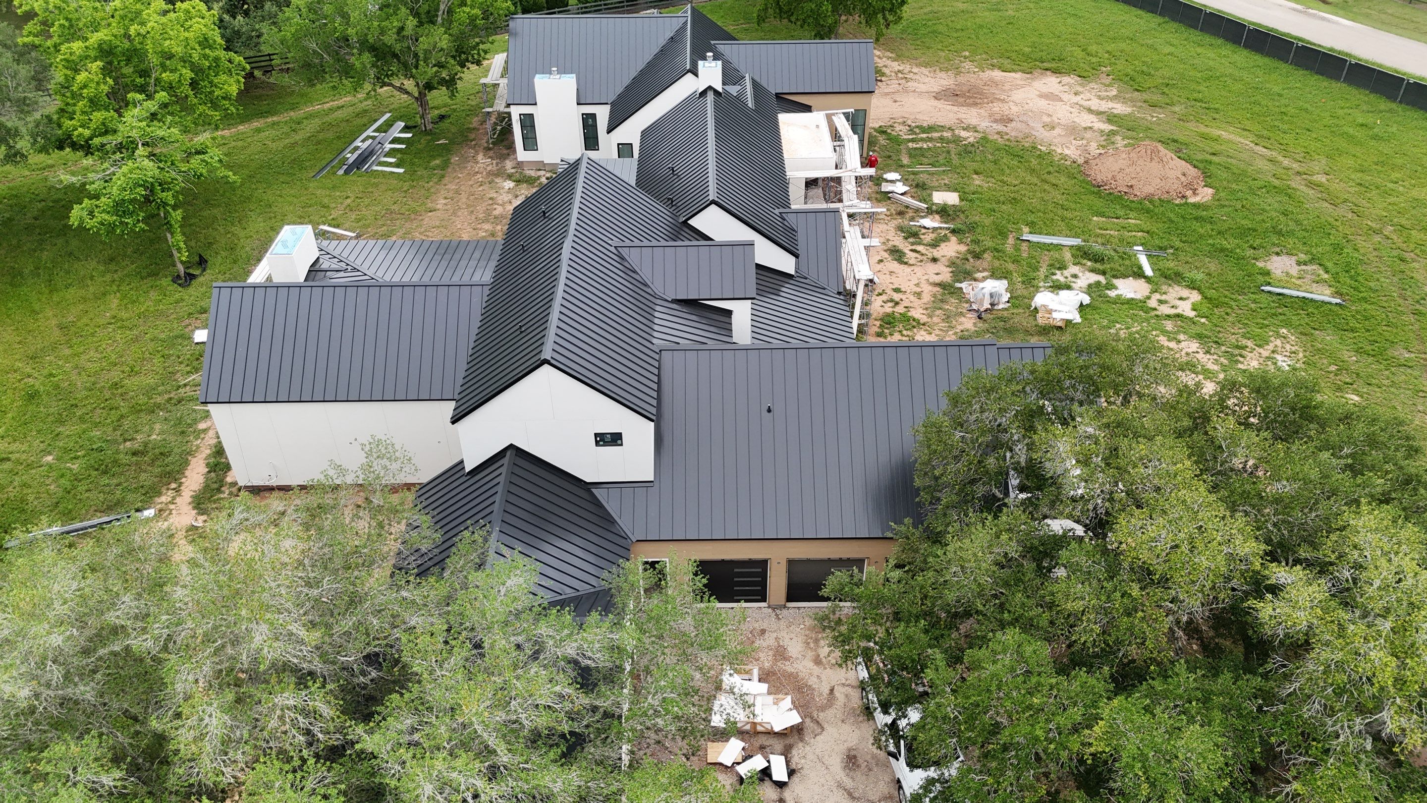 Matte Black Metal Roof by Level 7 Companies