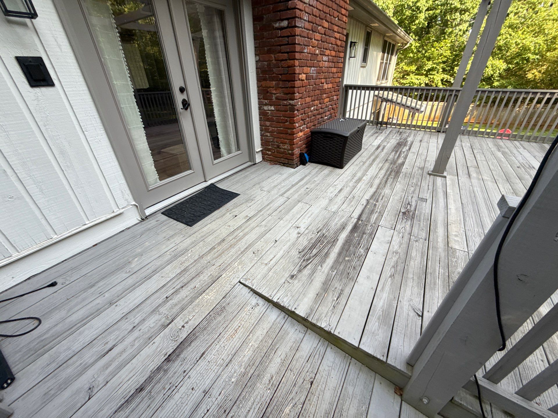Deck and Shed Roof Style Covered Build using Trex Decking Products by Nelson Exteriors 